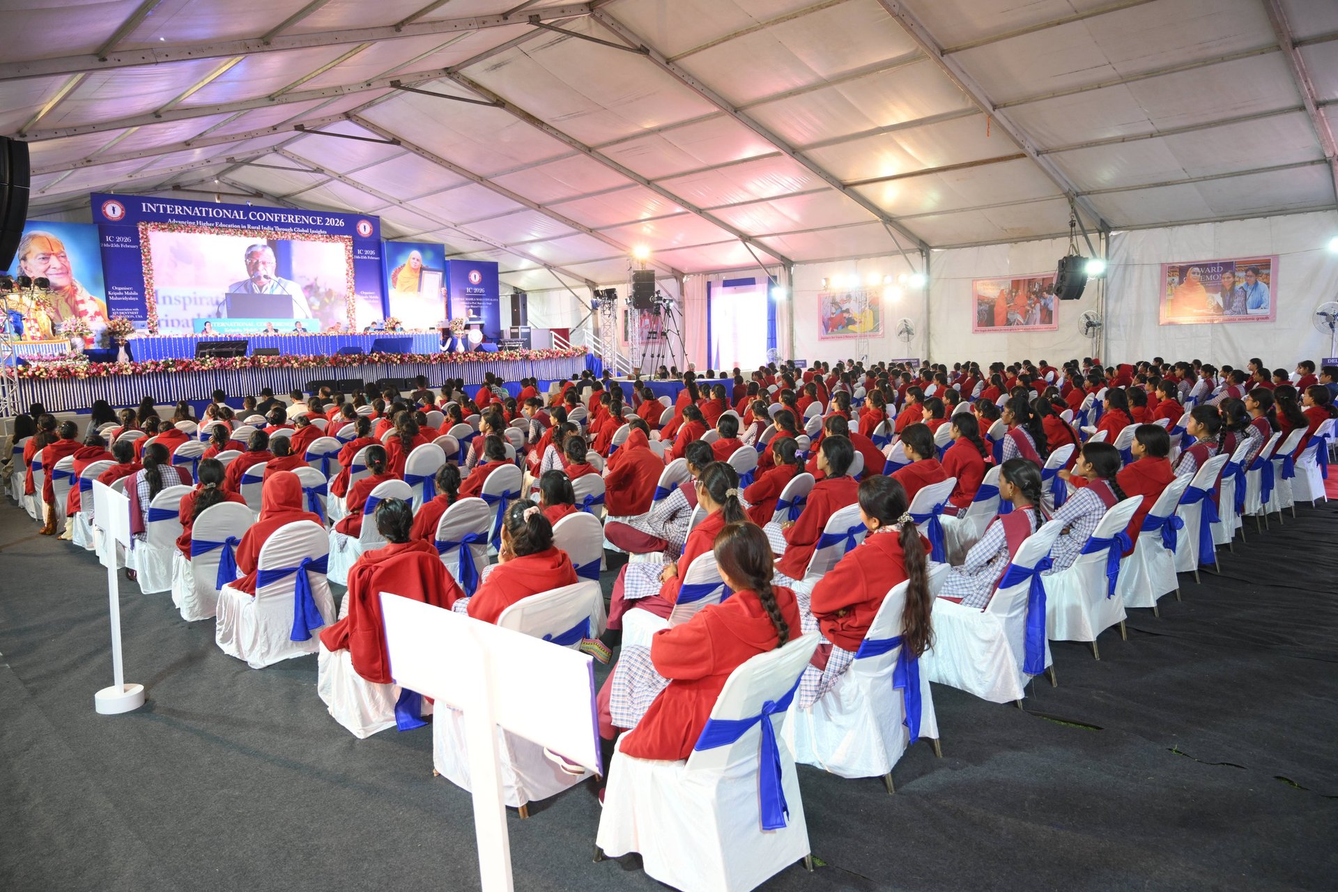 an abstract photo of a curved building with a blue sky in the background