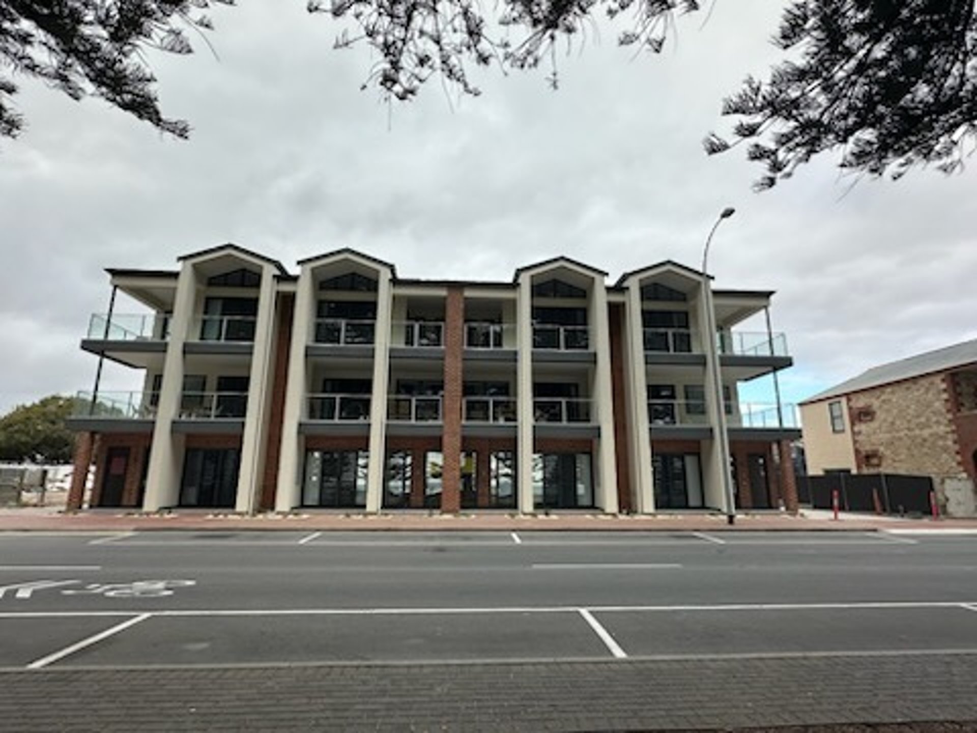 a body of water with a small island in the middle of it