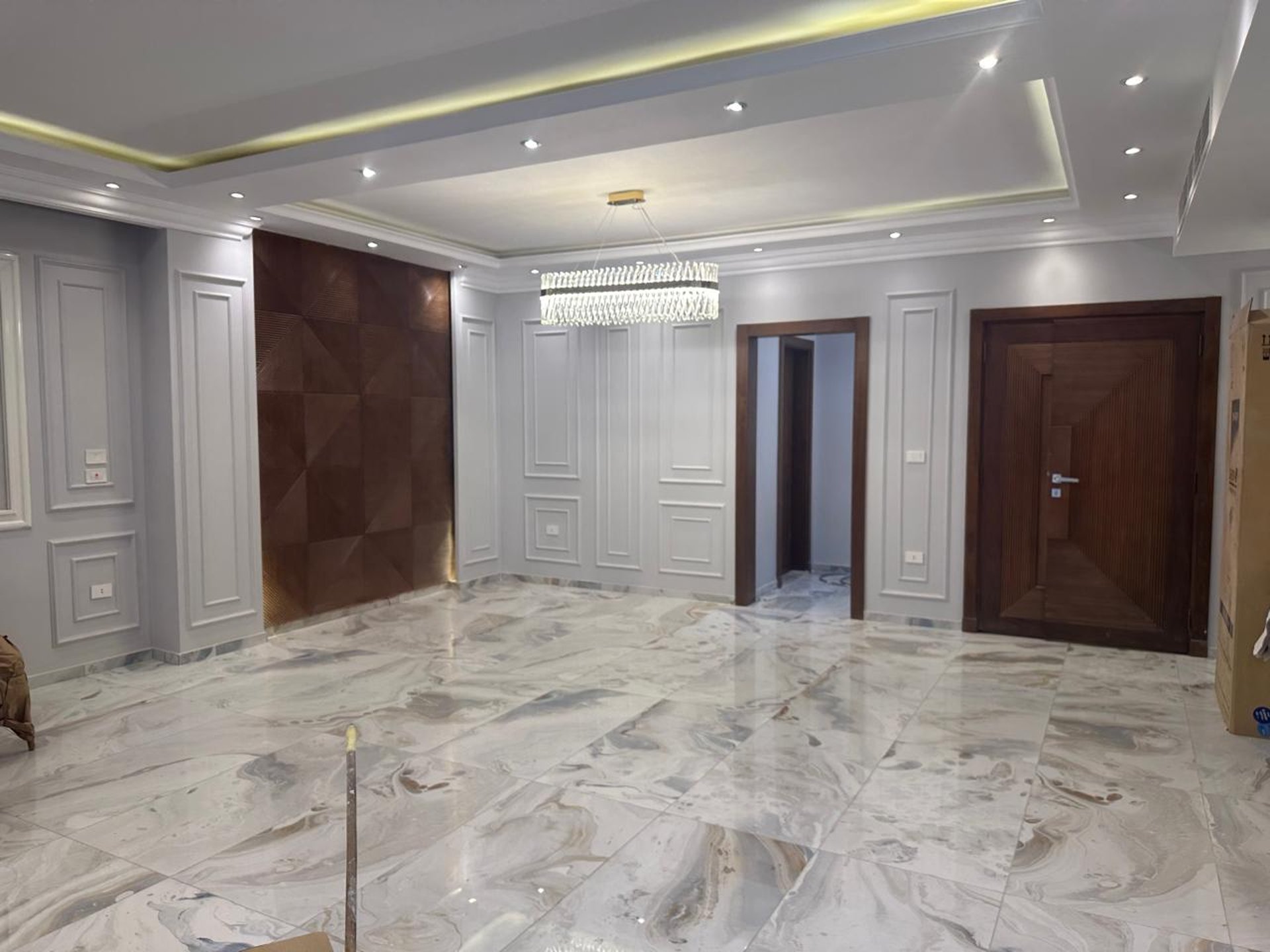 woman wearing yellow long-sleeved dress under white clouds and blue sky during daytime