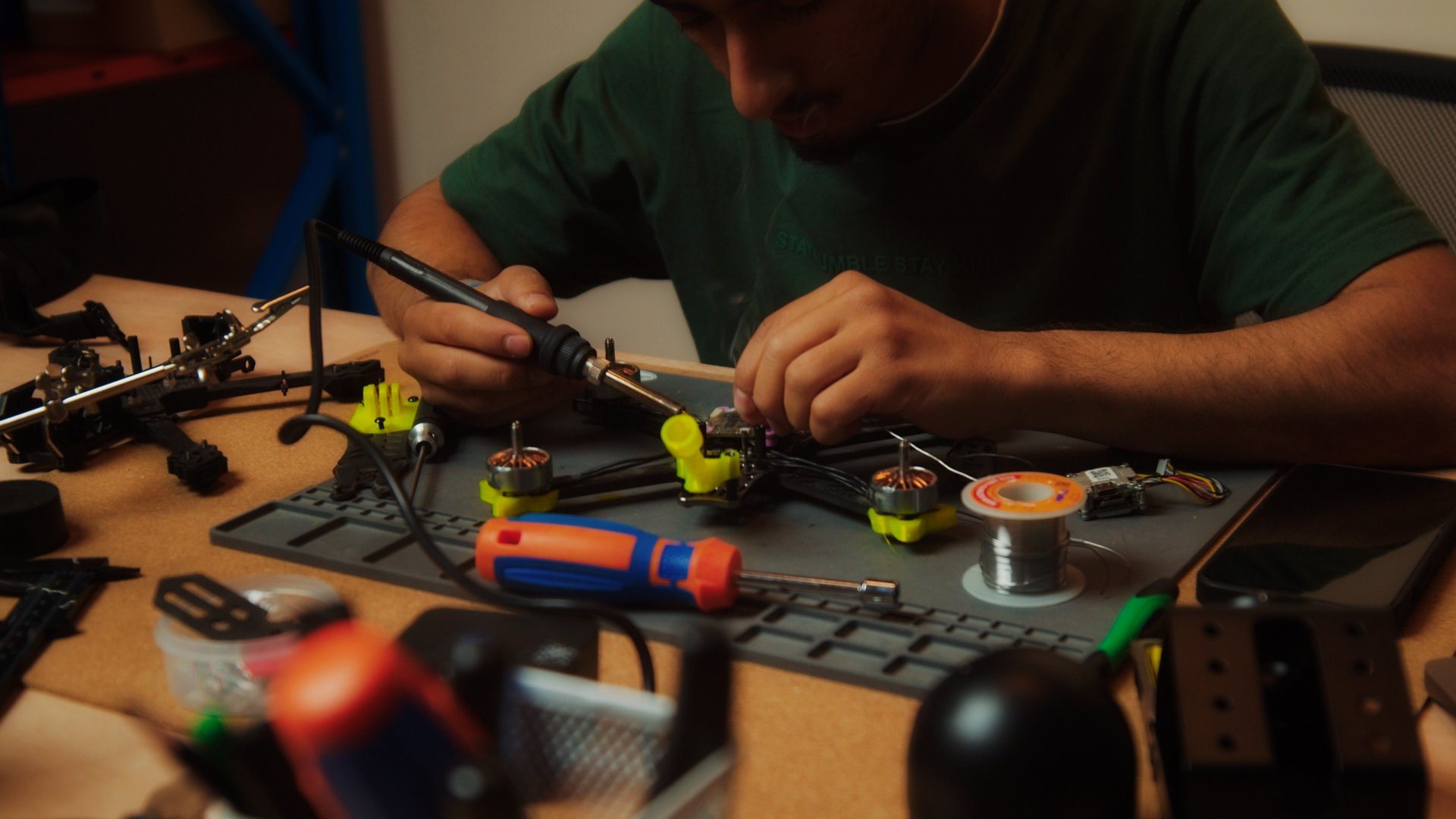 a close up of a black and brown abstract painting