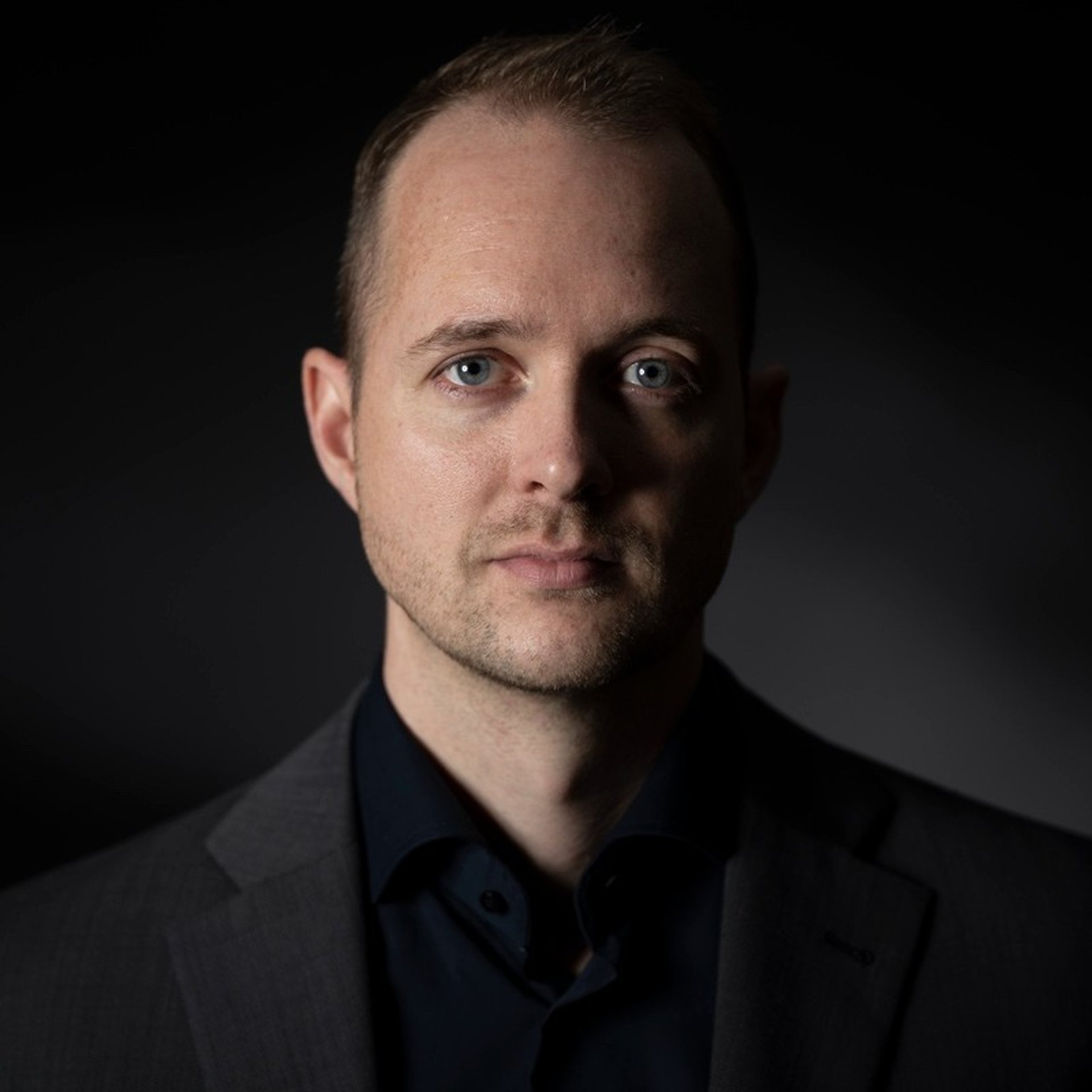 black and brown leather padded tub sofa