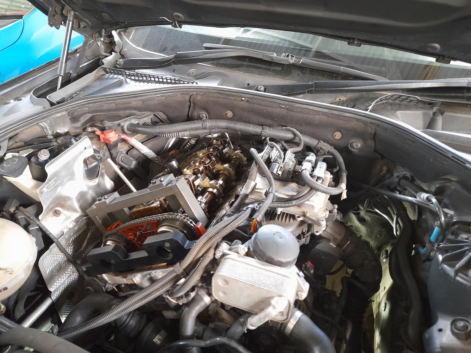 woman wearing yellow long-sleeved dress under white clouds and blue sky during daytime