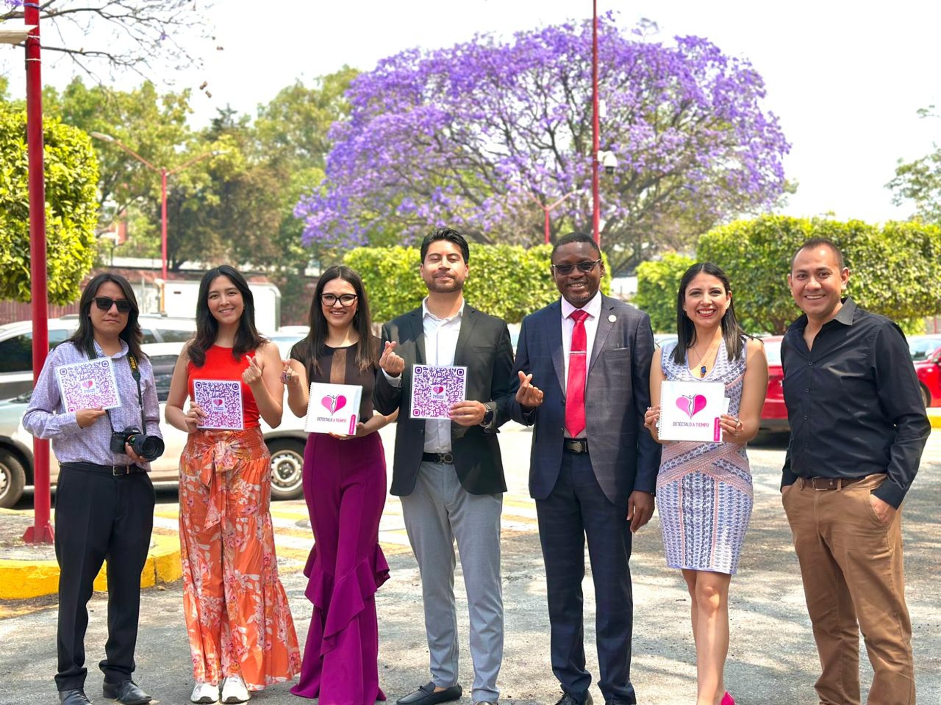 woman wearing yellow long-sleeved dress under white clouds and blue sky during daytime