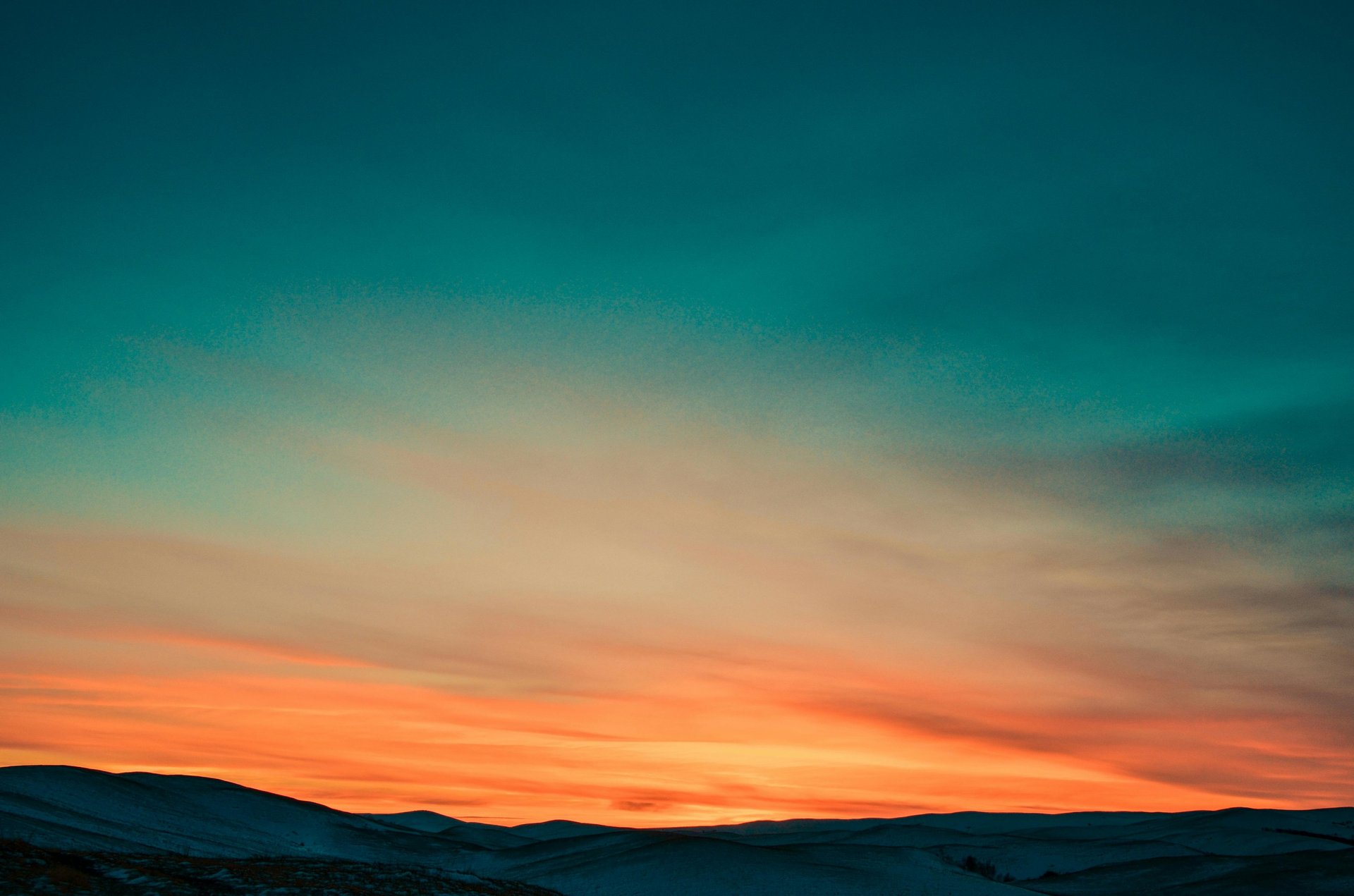 orange and blue sky during sunset