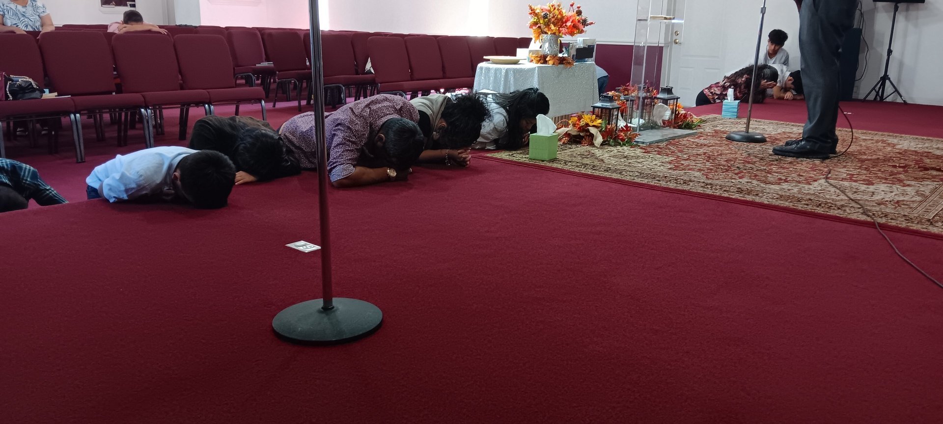an abstract photo of a curved building with a blue sky in the background
