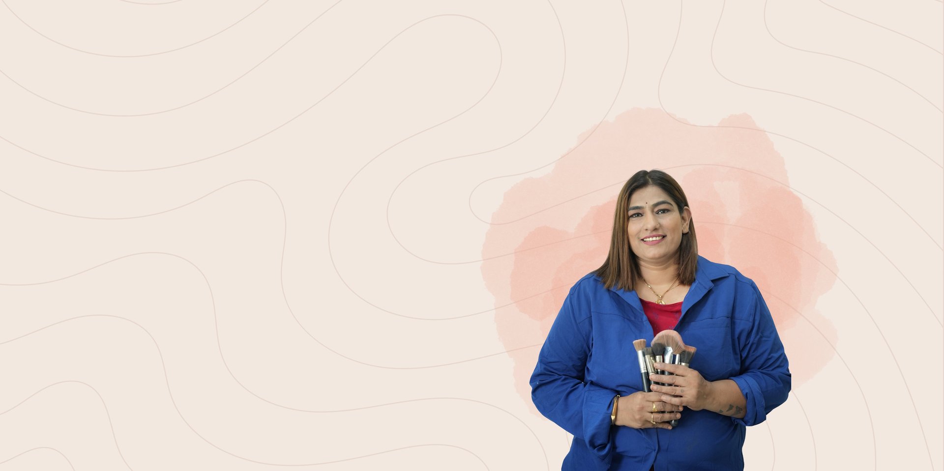 a close up of a makeup brush on a black background