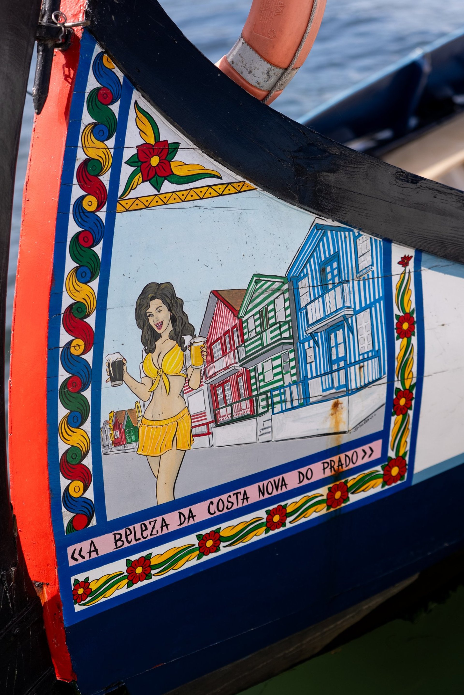blue and brown boat on water during daytime
