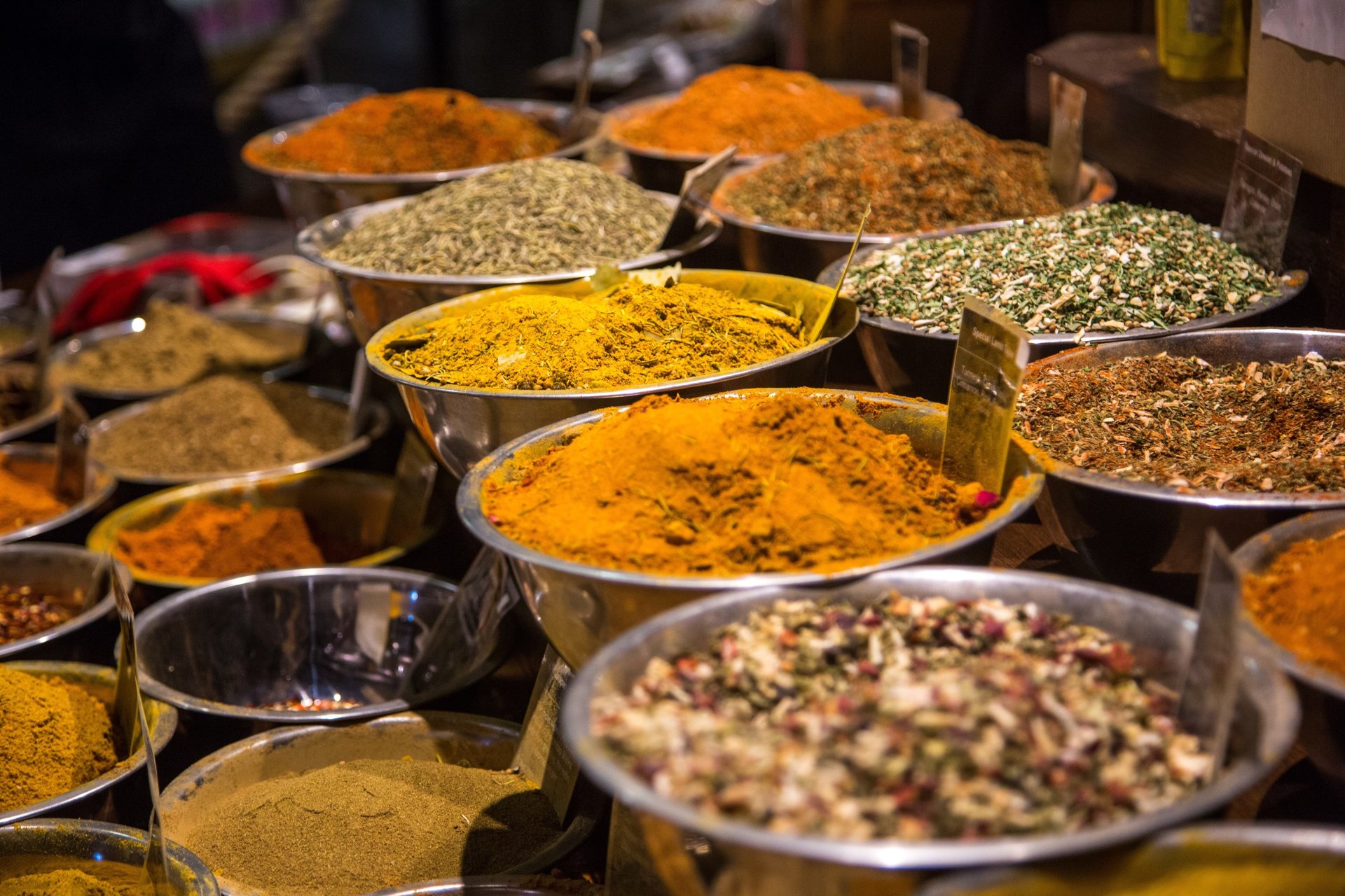 a table topped with different types of spices