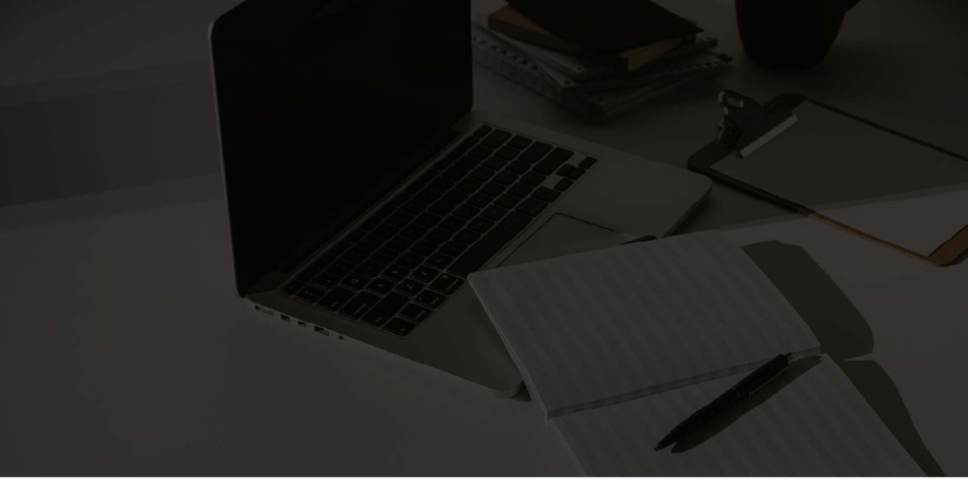 an abstract photo of a curved building with a blue sky in the background