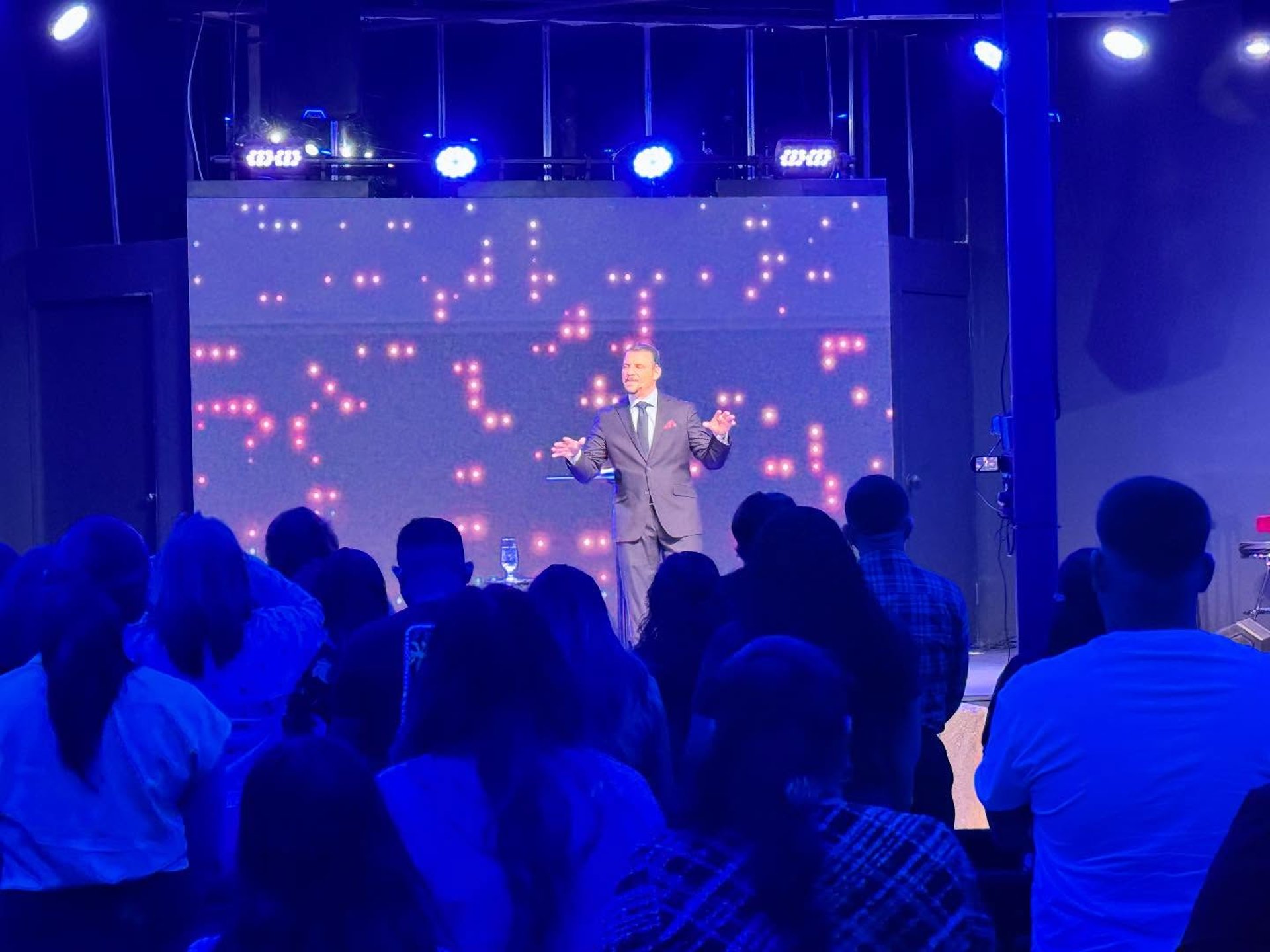 woman wearing yellow long-sleeved dress under white clouds and blue sky during daytime