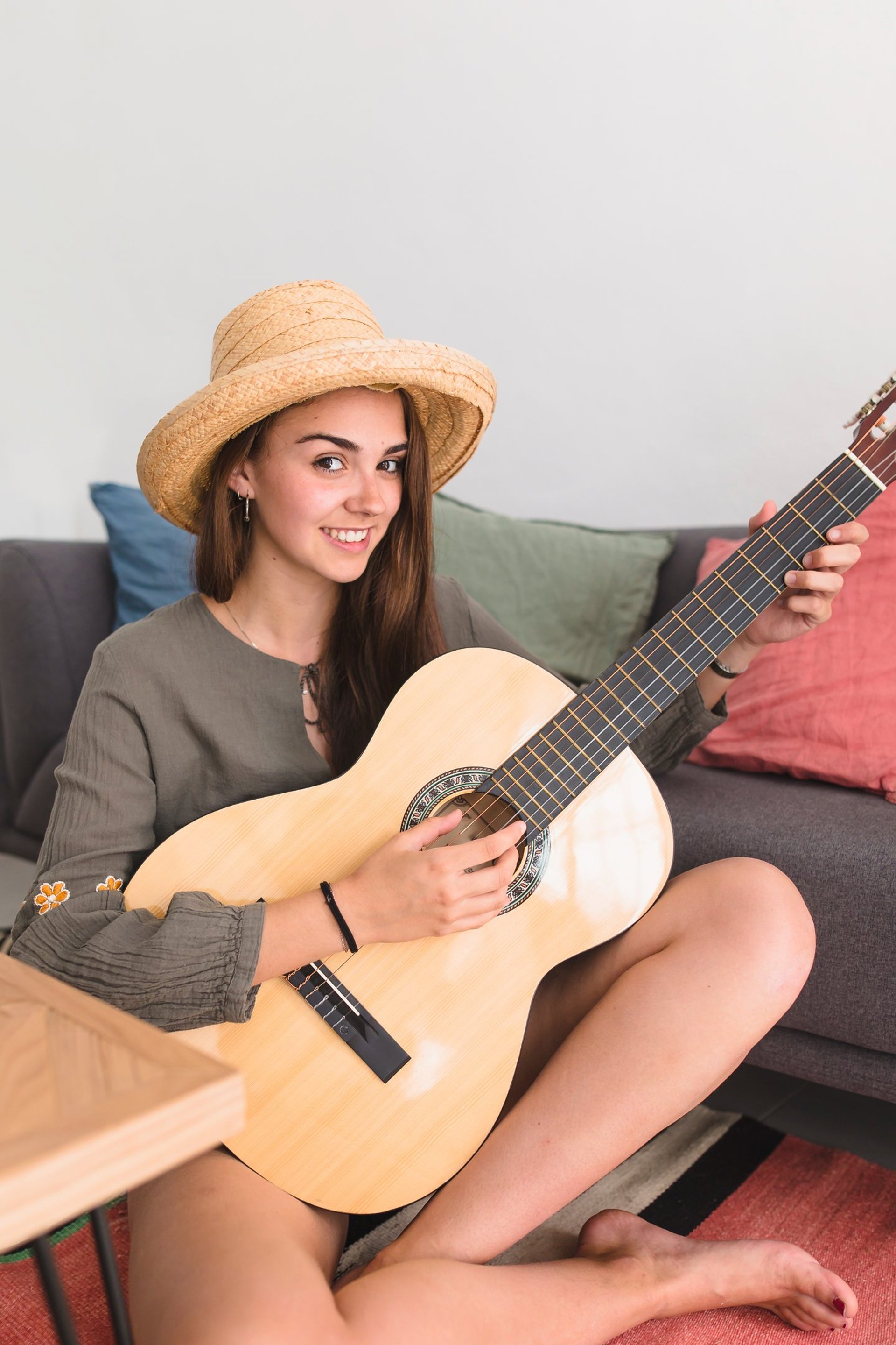 A group of men playing guitars on stage
