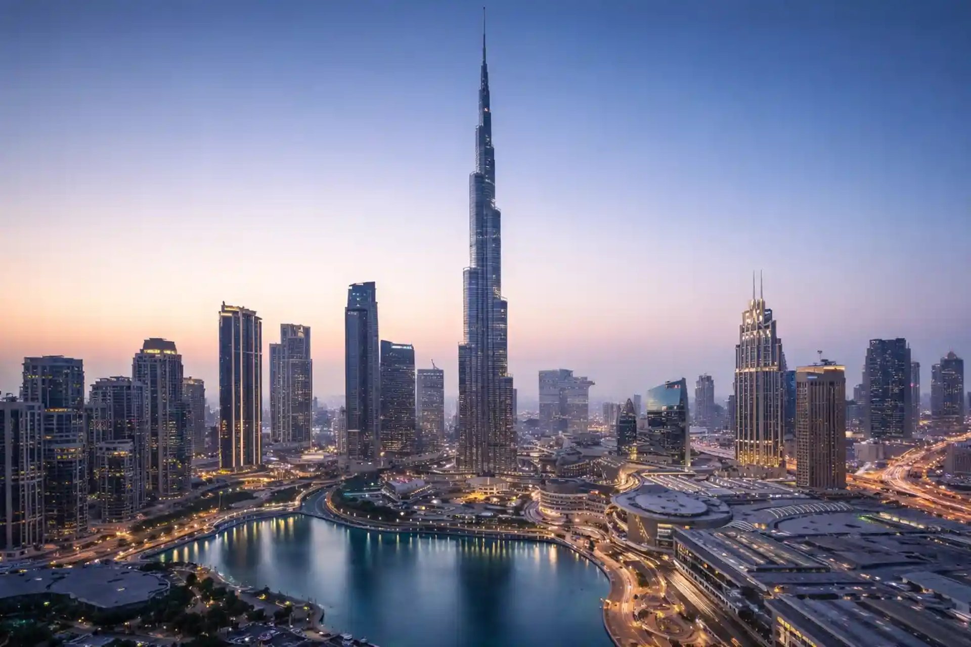 an abstract photo of a curved building with a blue sky in the background