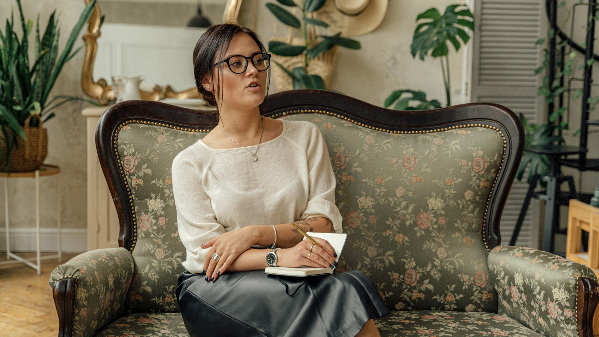 an abstract photo of a curved building with a blue sky in the background
