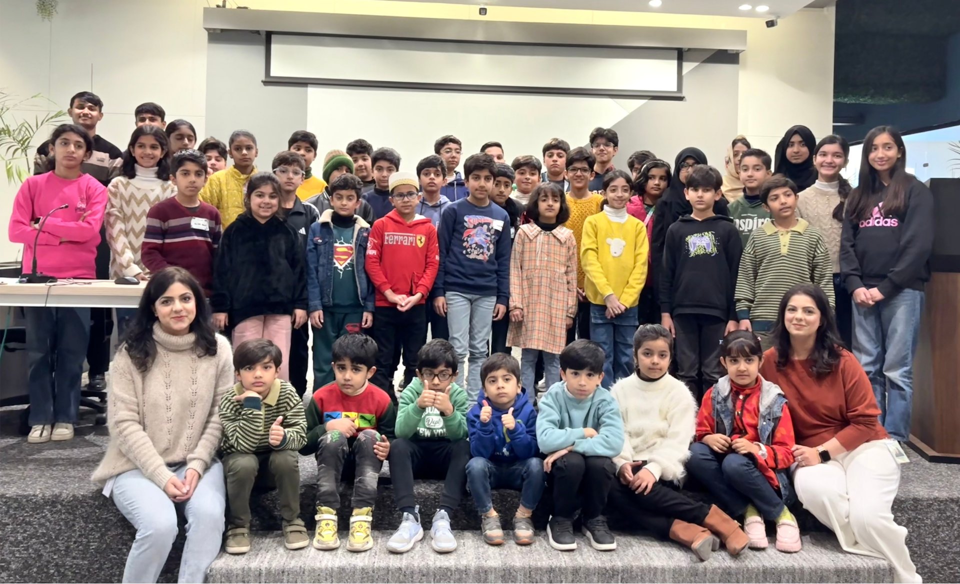 a black and white photo of a person laying on a bed
