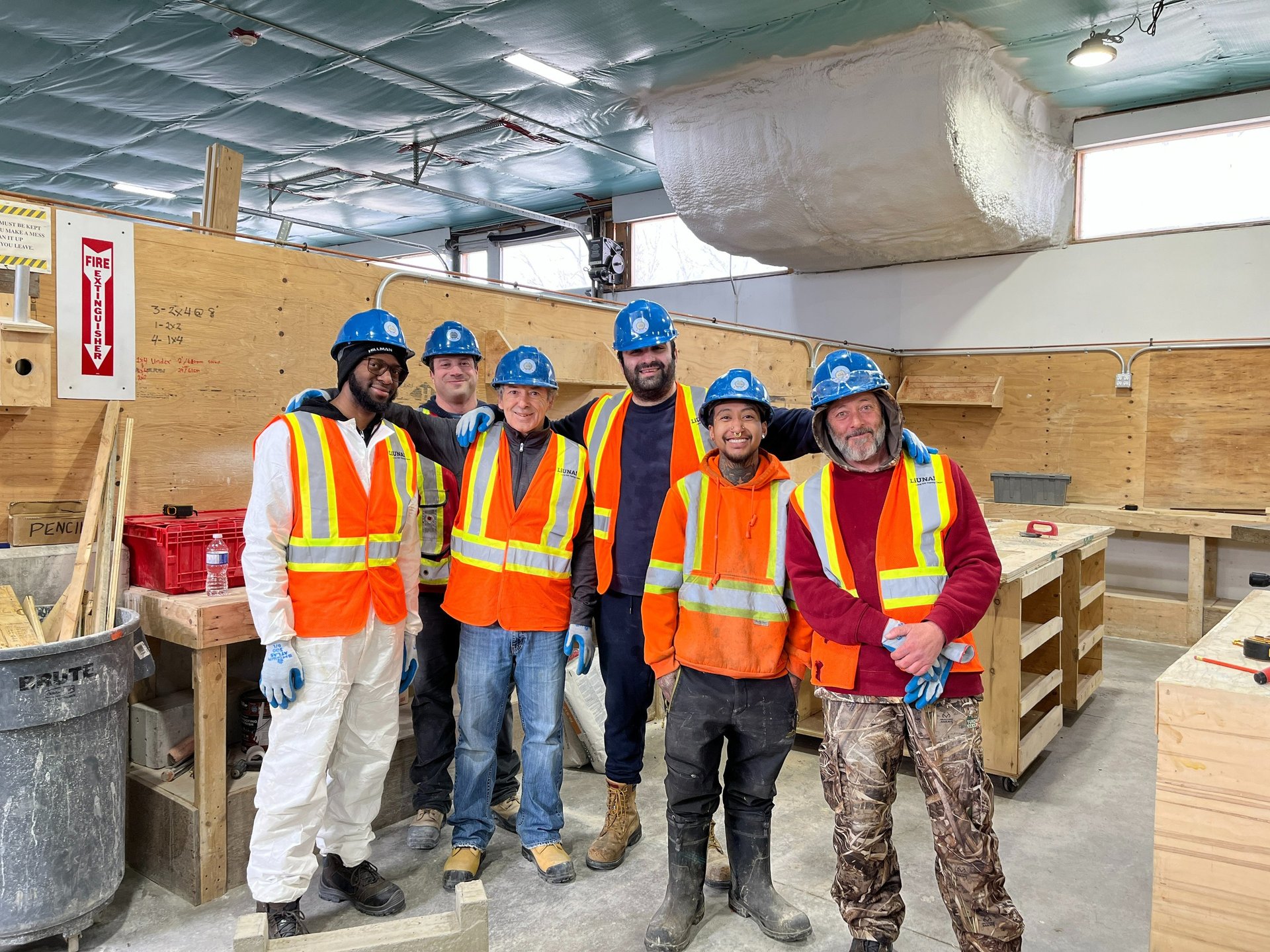an abstract photo of a curved building with a blue sky in the background