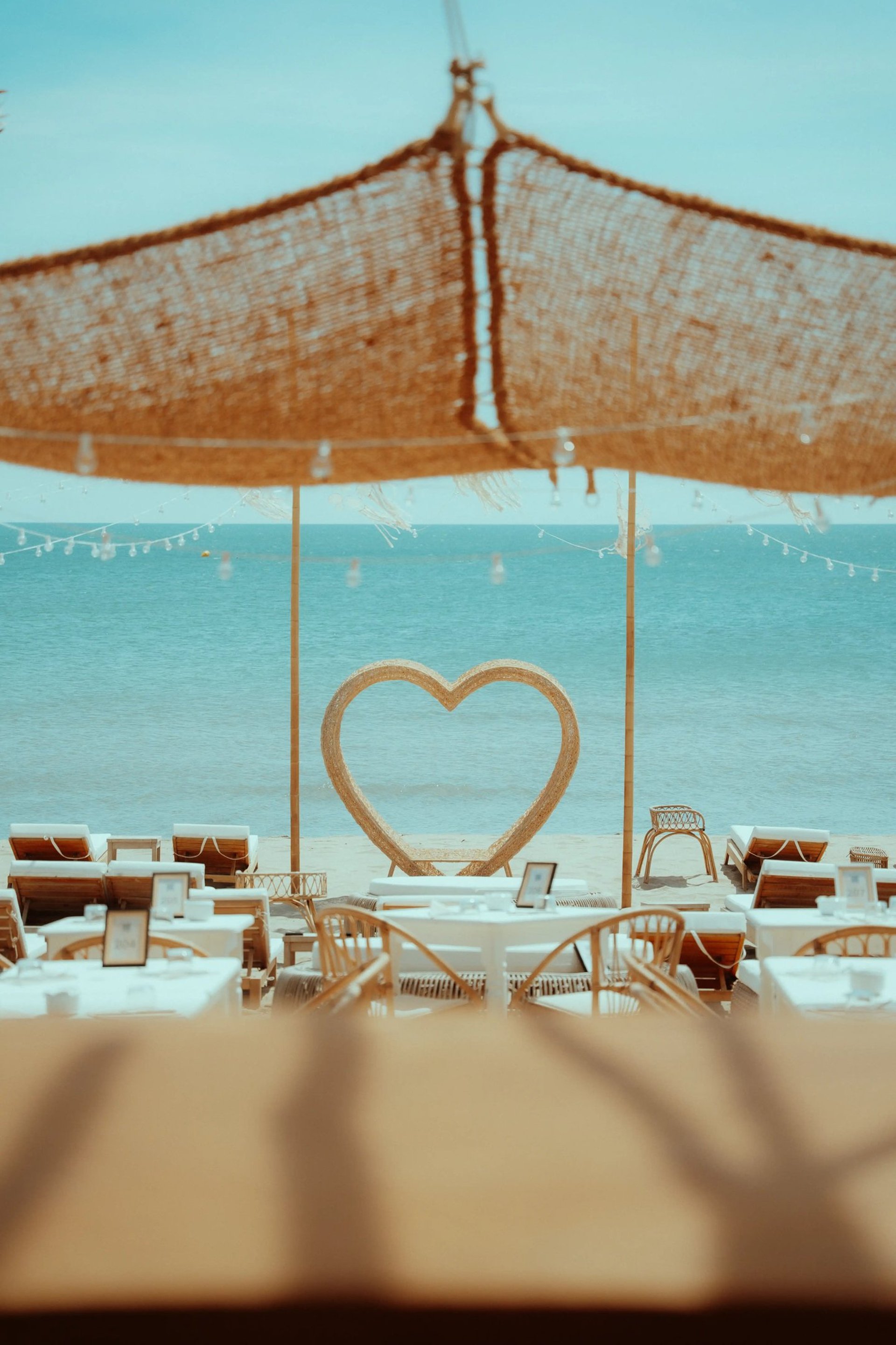 woman wearing yellow long-sleeved dress under white clouds and blue sky during daytime