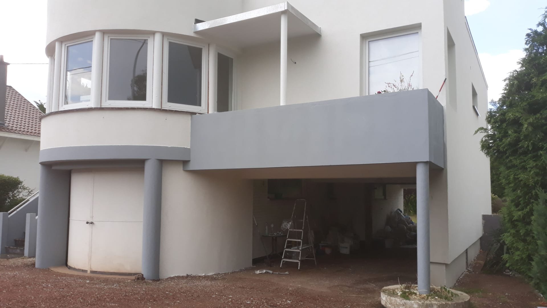woman wearing yellow long-sleeved dress under white clouds and blue sky during daytime