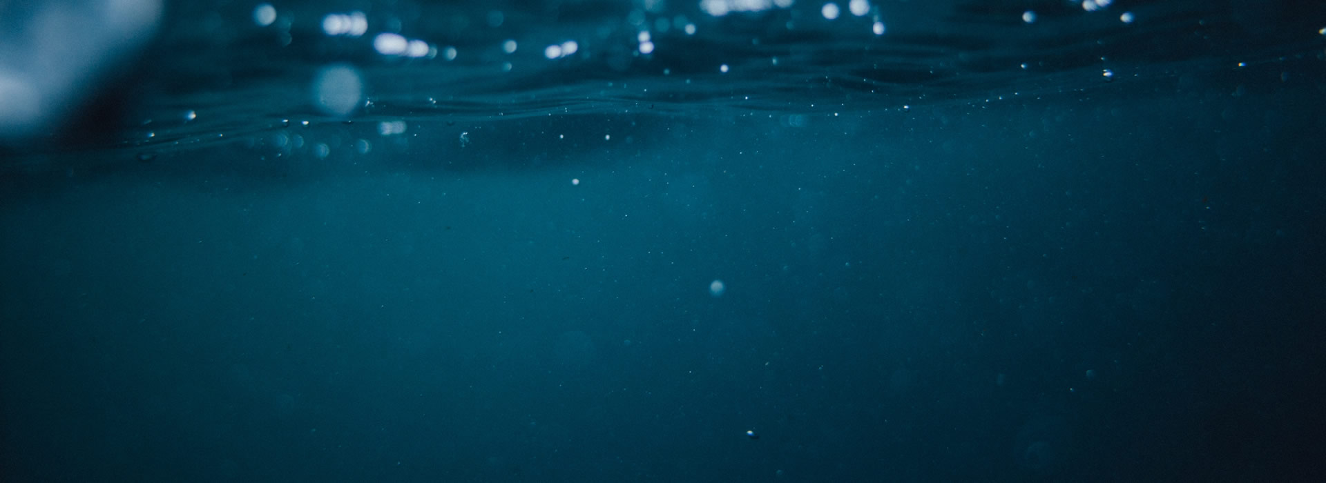 a close up of a black and brown abstract painting