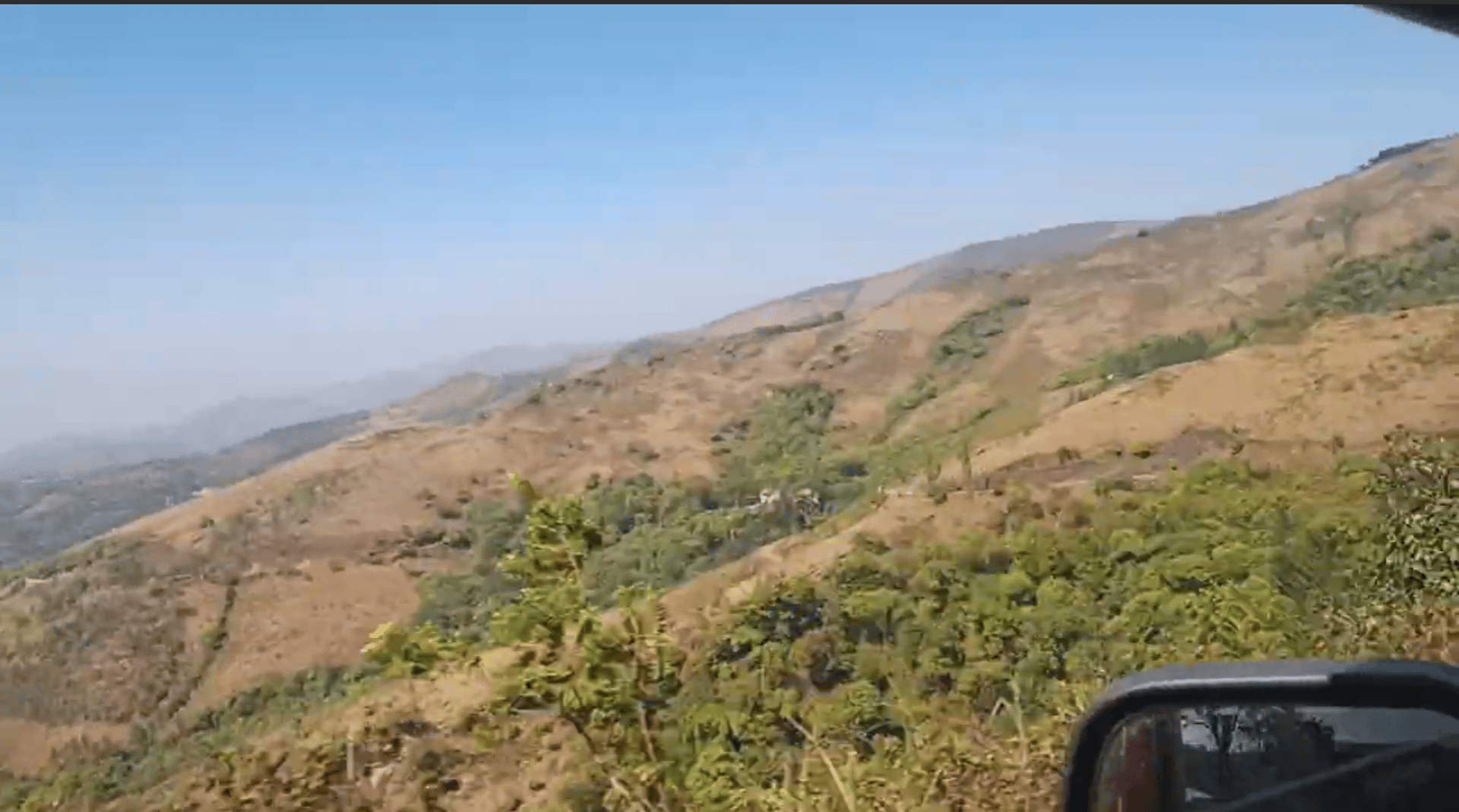 brown leather horse saddle on fence