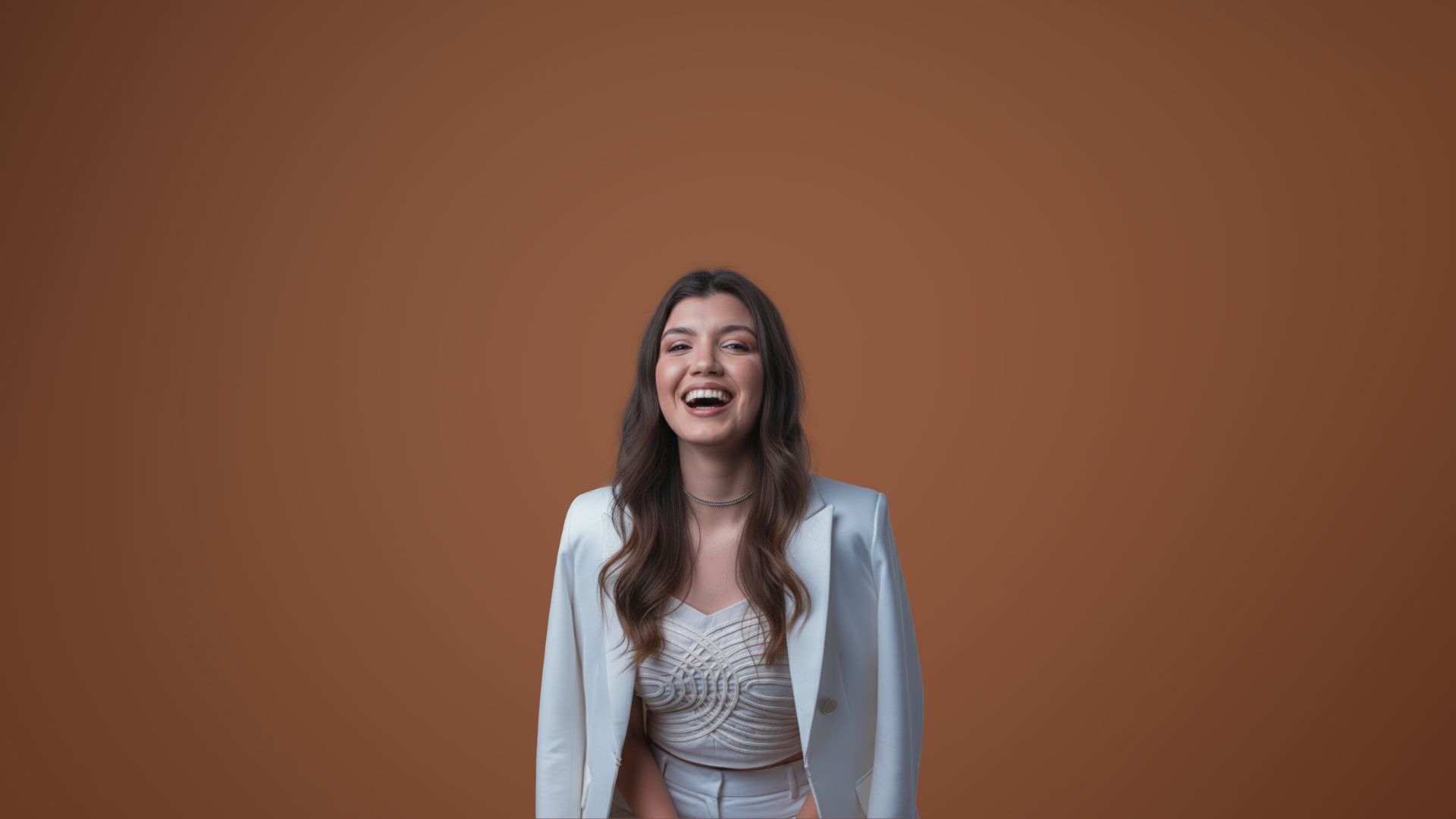 an abstract photo of a curved building with a blue sky in the background