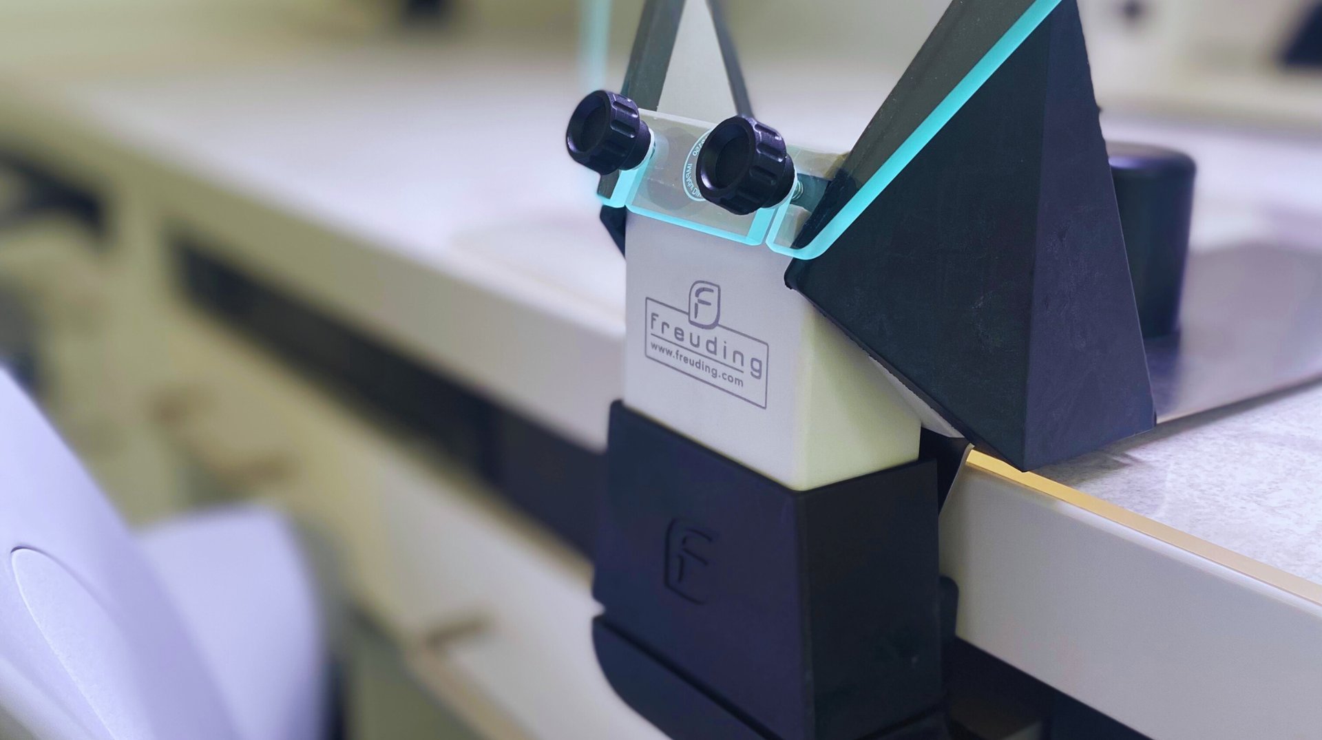 an abstract photo of a curved building with a blue sky in the background