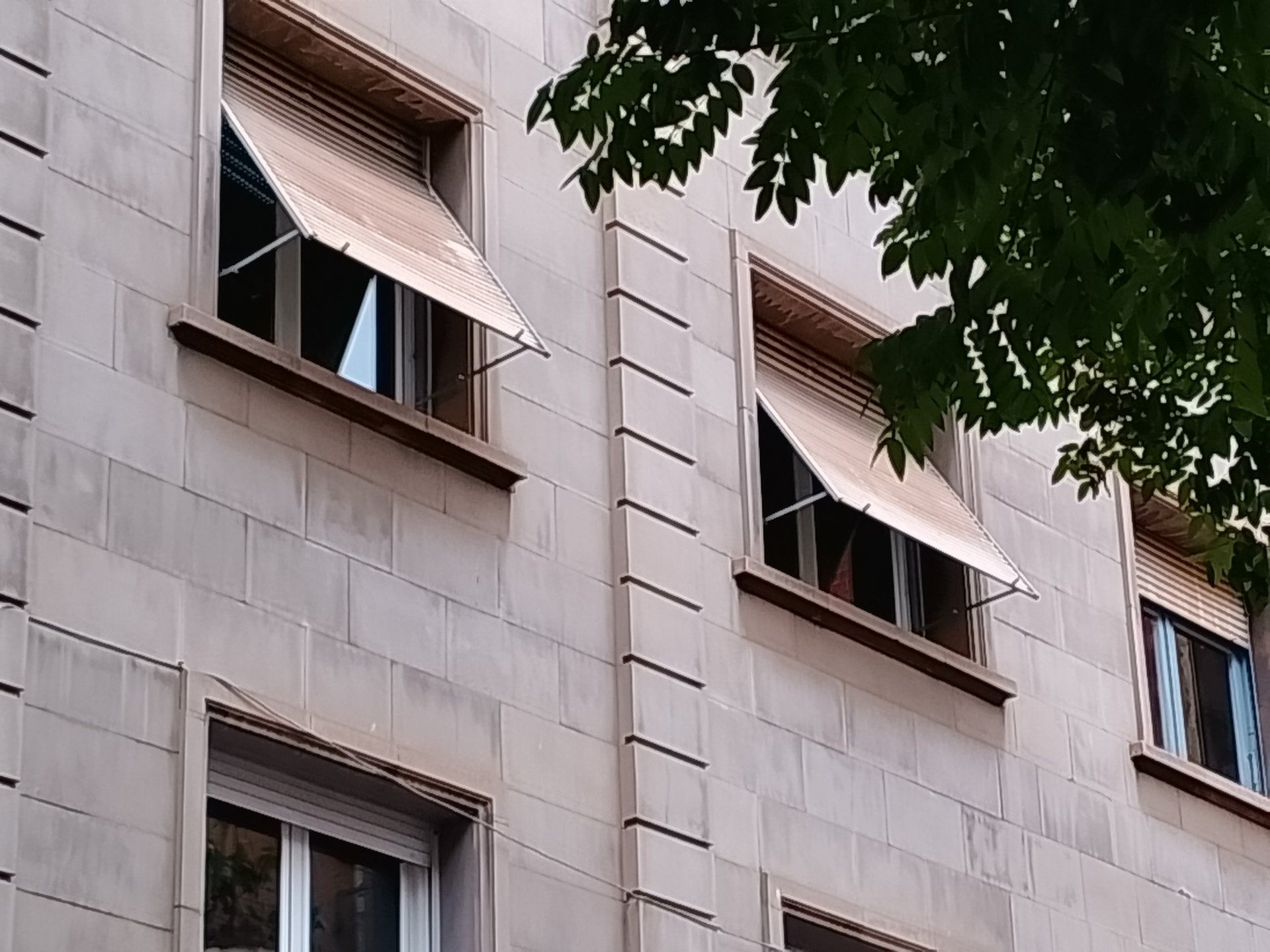 black and brown leather padded tub sofa