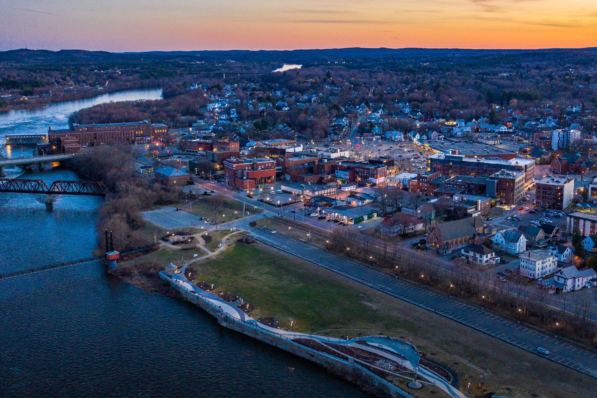 black and brown leather padded tub sofa
