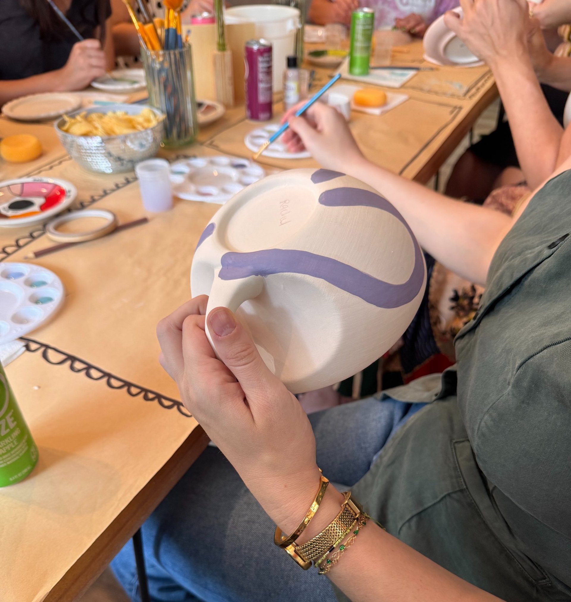 woman holding dried flower