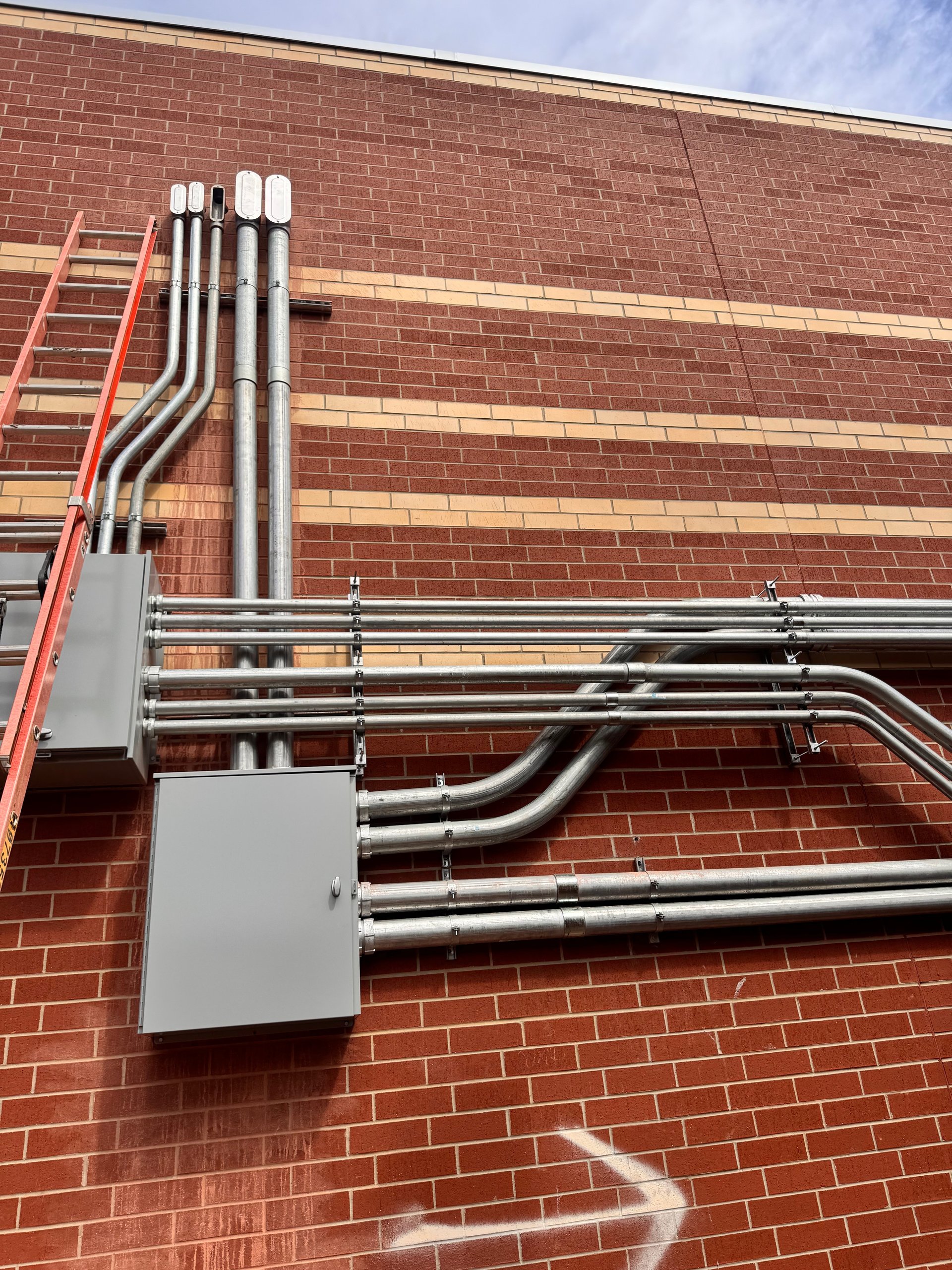 black and brown leather padded tub sofa