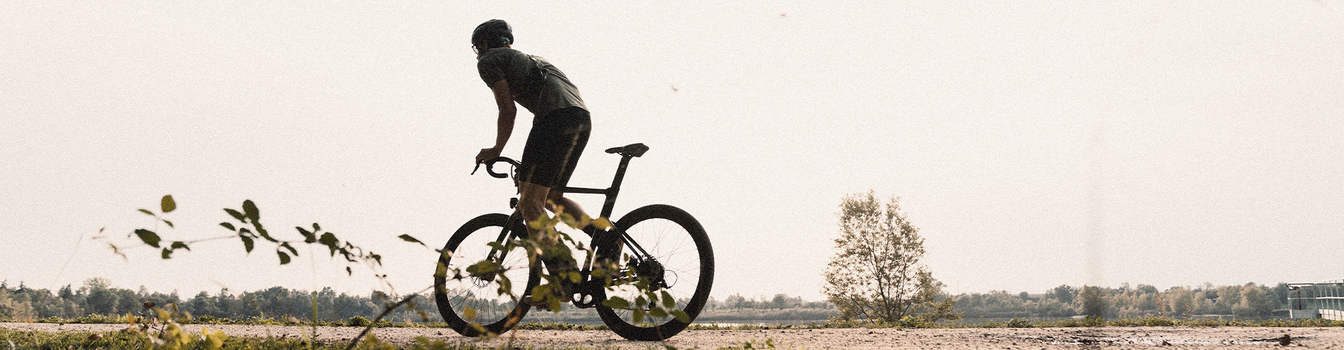 an abstract photo of a curved building with a blue sky in the background