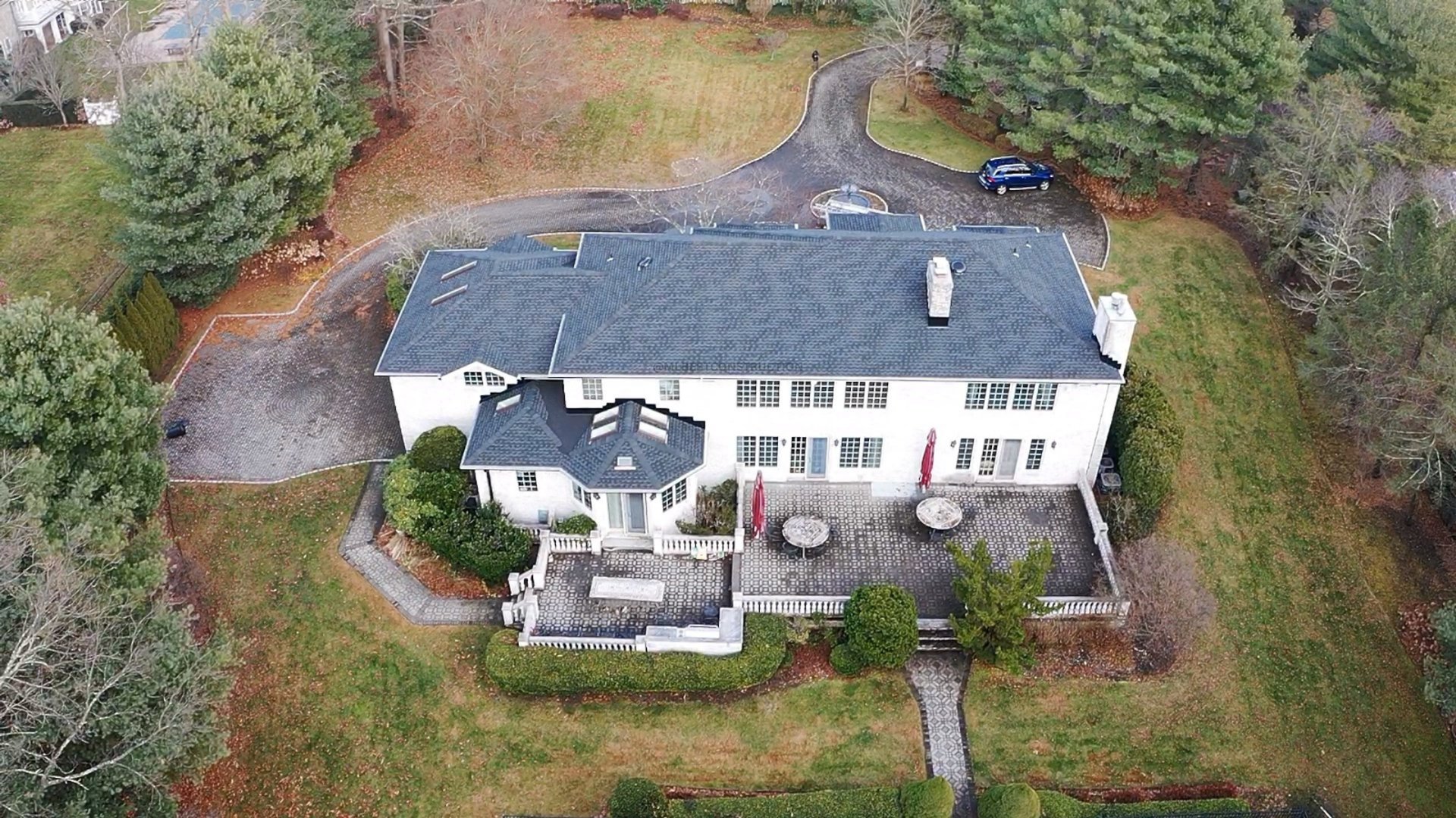 black and brown leather padded tub sofa