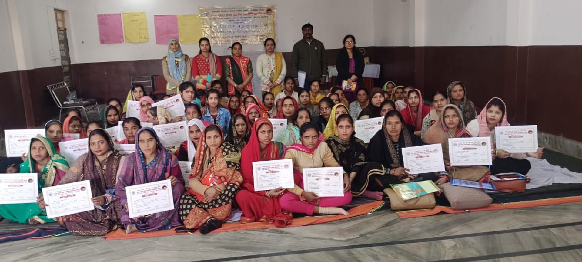 a group of young children standing next to each other