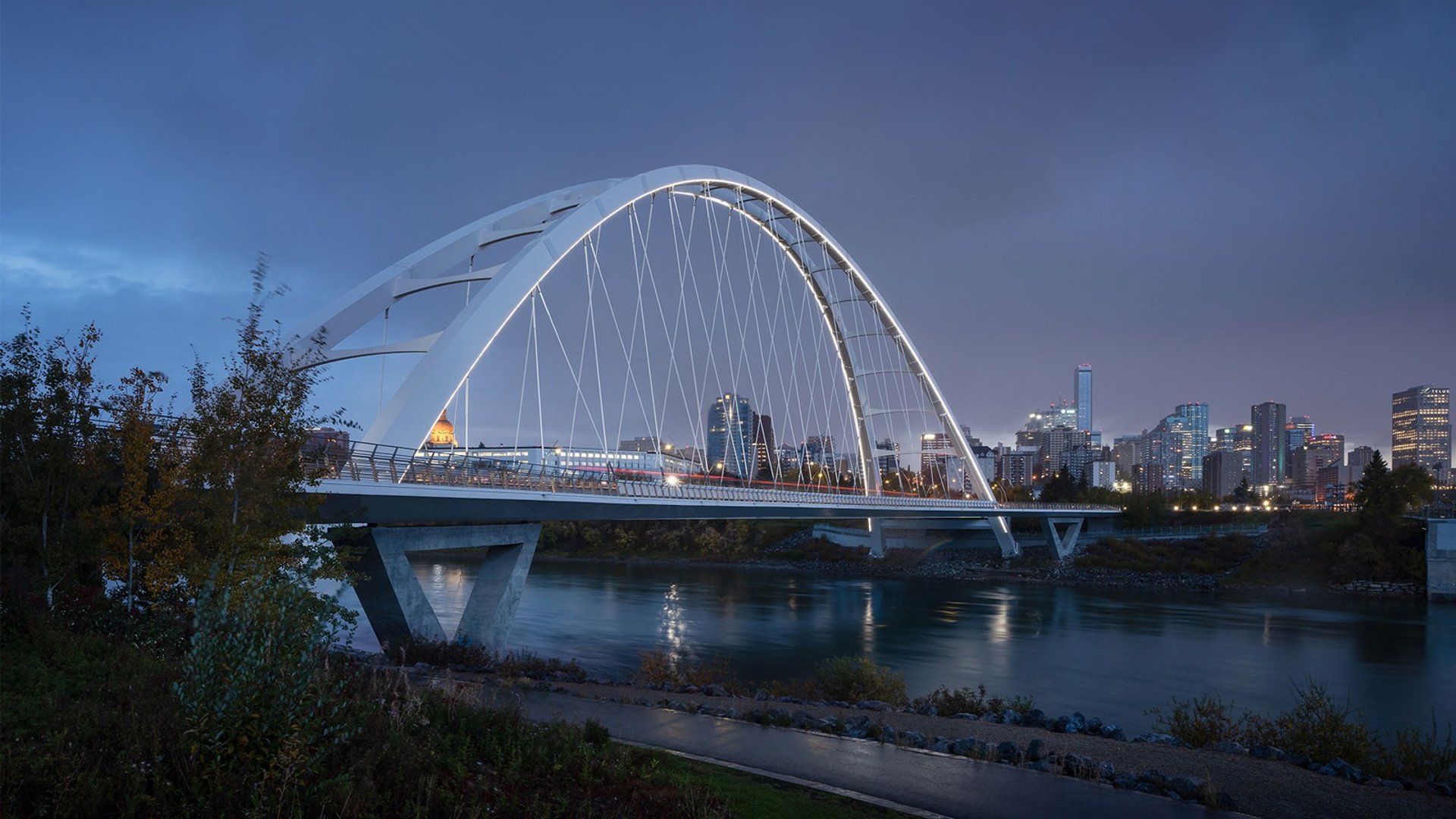 black and brown leather padded tub sofa