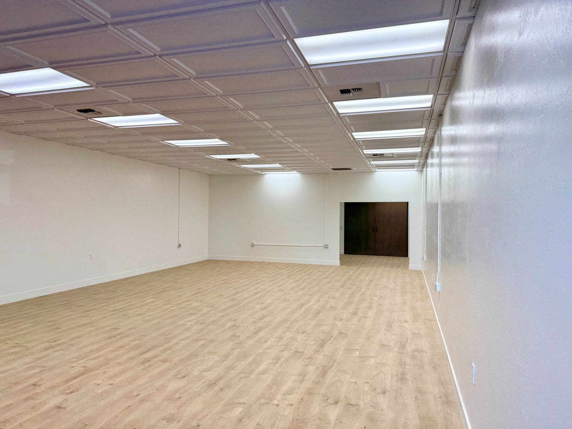 black and brown leather padded tub sofa