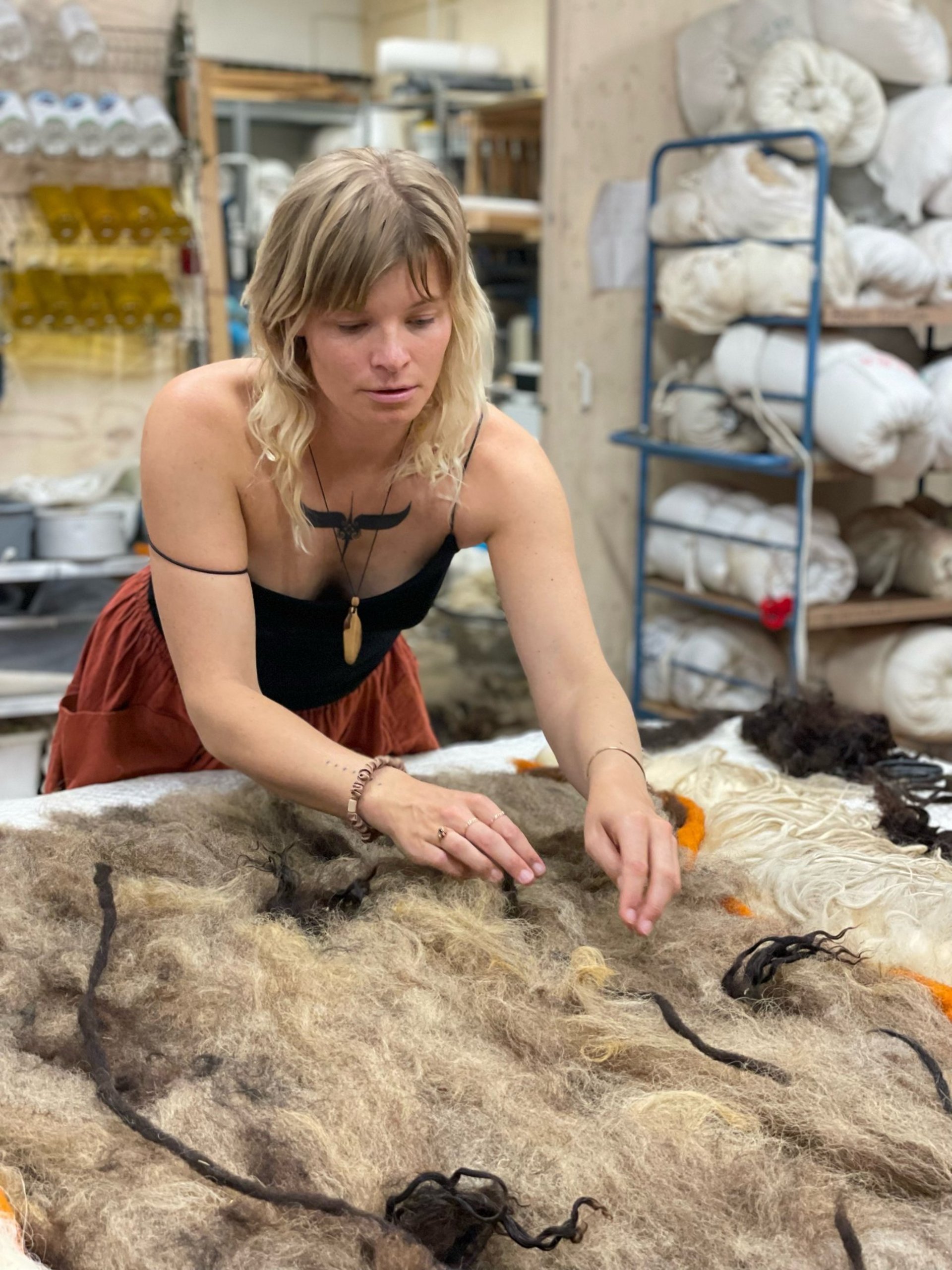 a rock formation with carvings on it and a sky background