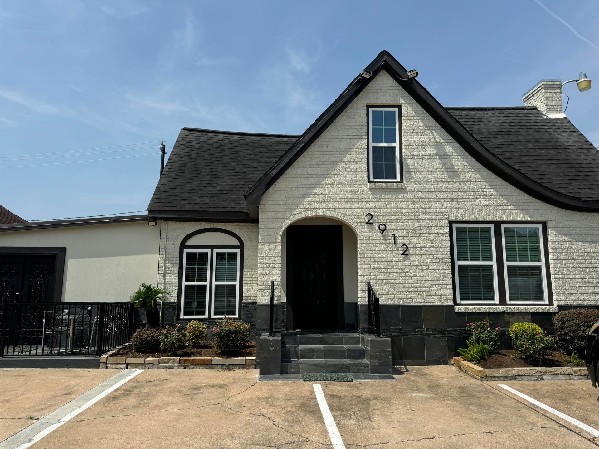 black and brown leather padded tub sofa
