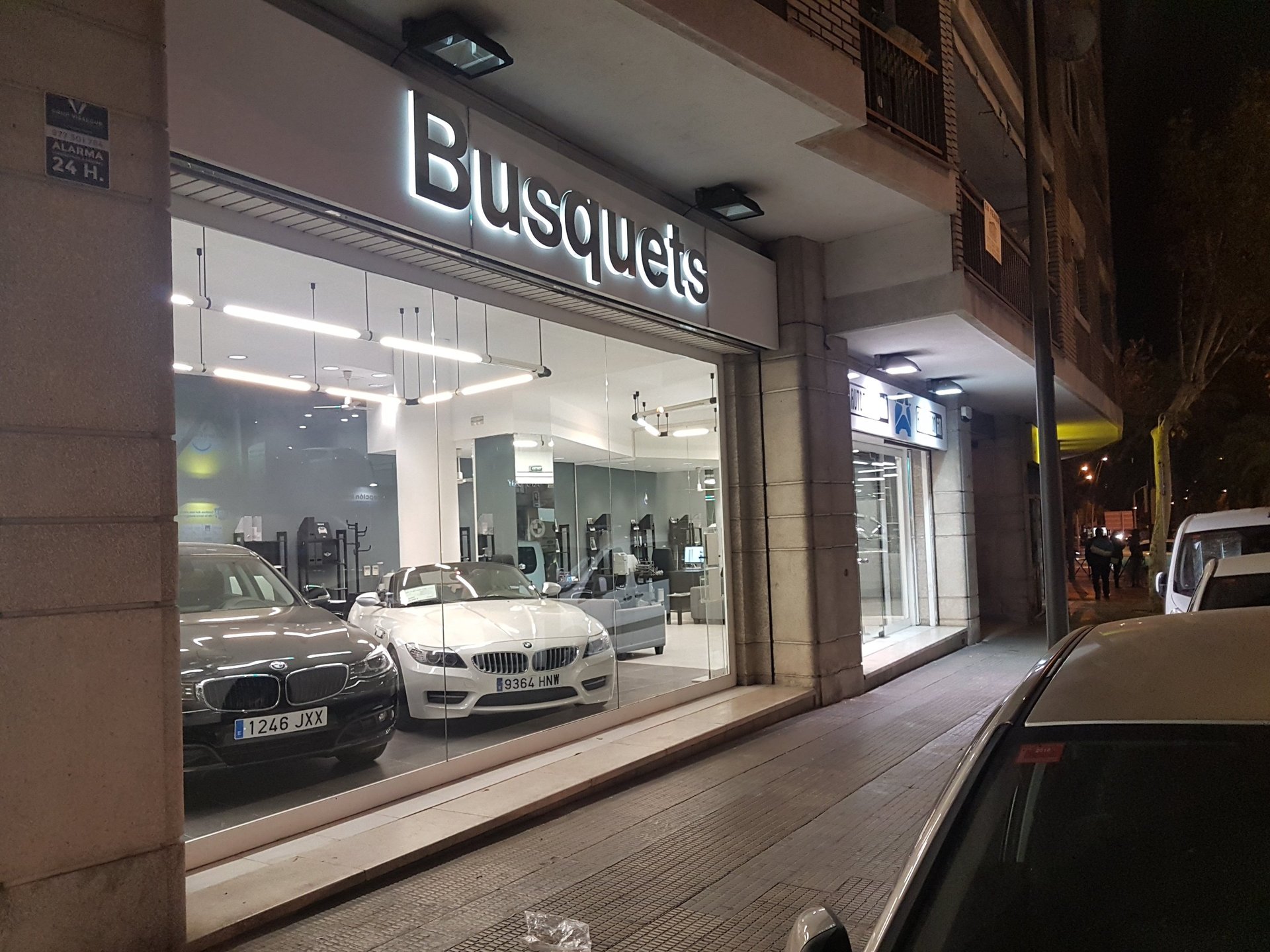 a couple of cars that are sitting in the street