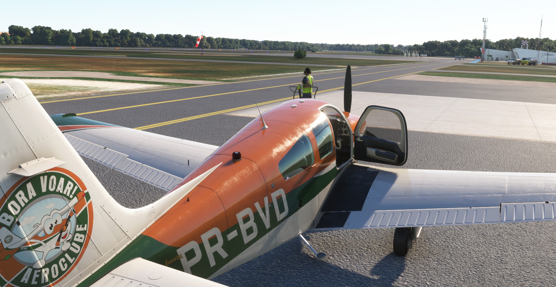 woman wearing yellow long-sleeved dress under white clouds and blue sky during daytime