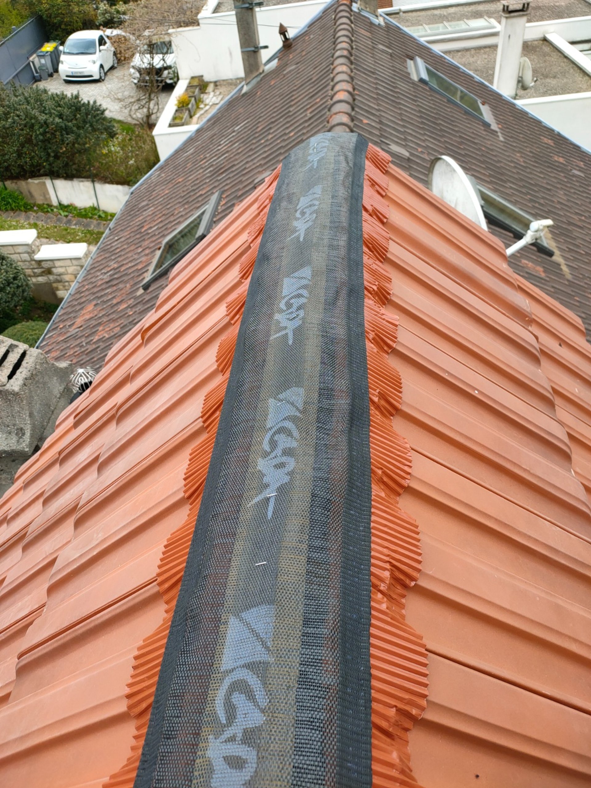 A man on a roof working on a roof