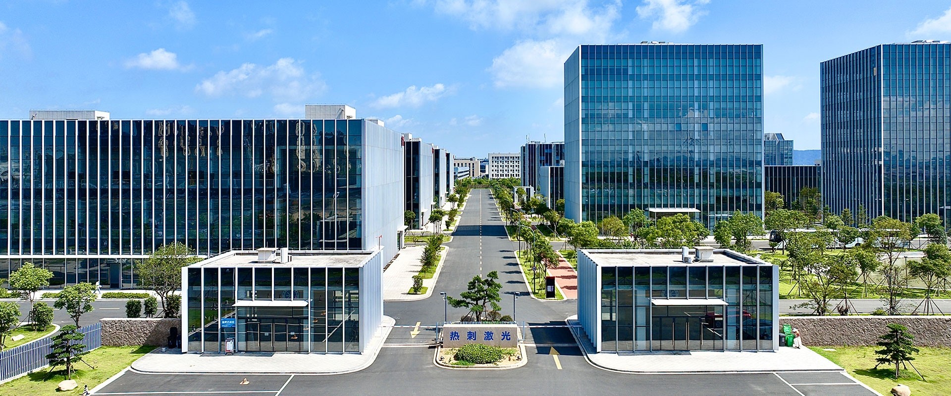 an abstract photo of a curved building with a blue sky in the background