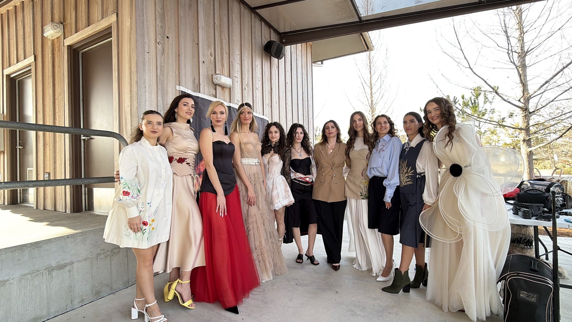 an abstract photo of a curved building with a blue sky in the background