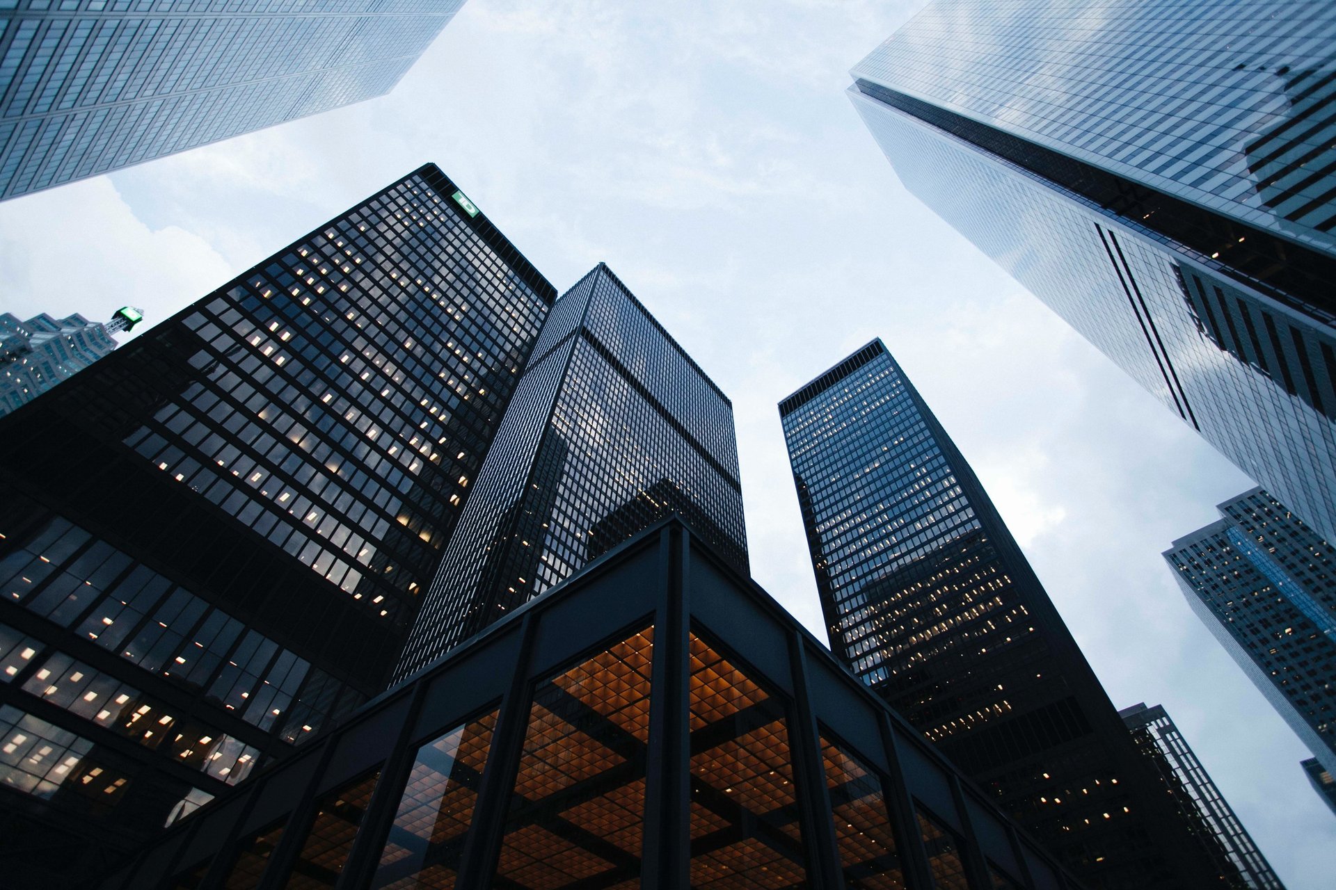 low angle photography of gray building at daytime