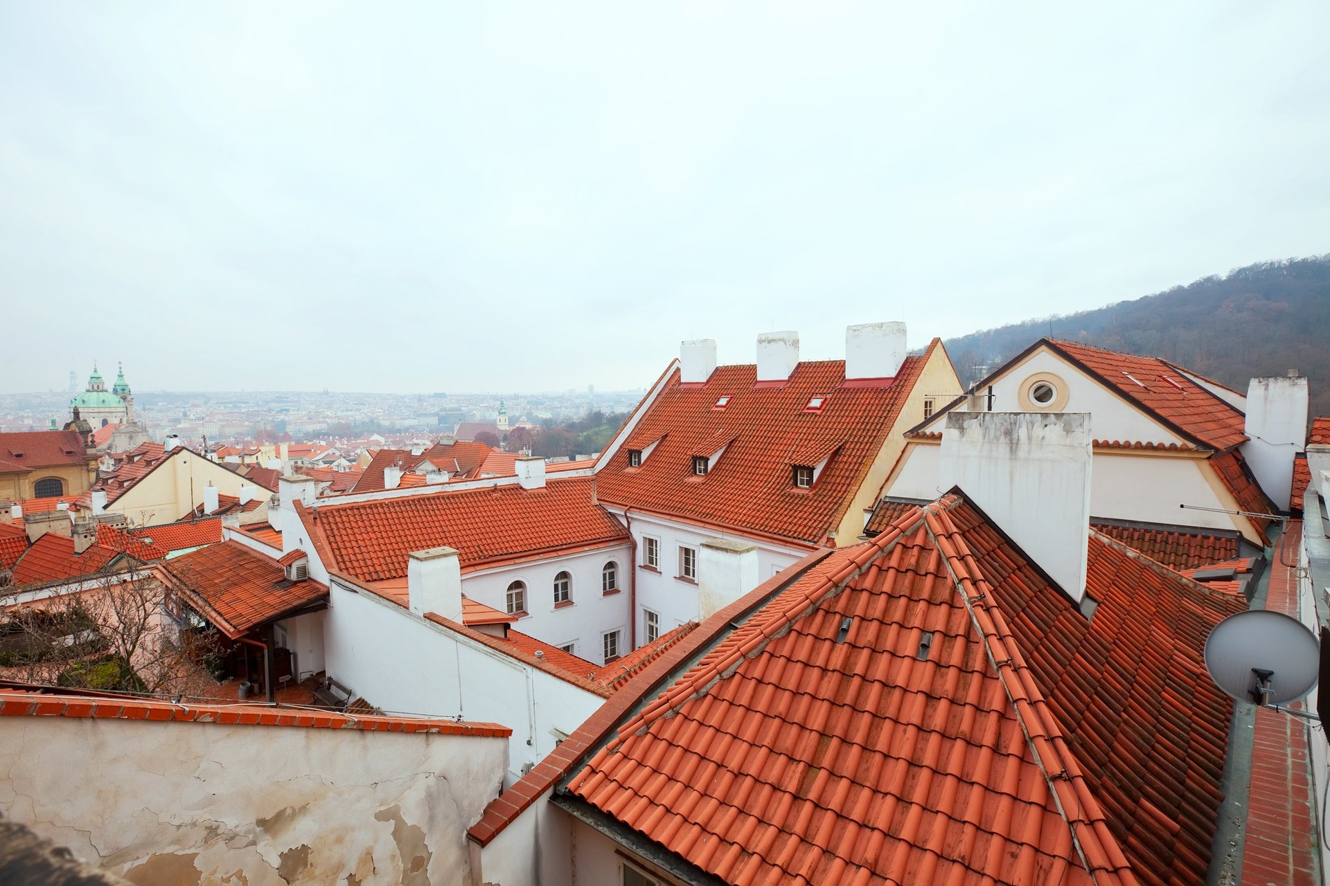 an abstract photo of a curved building with a blue sky in the background