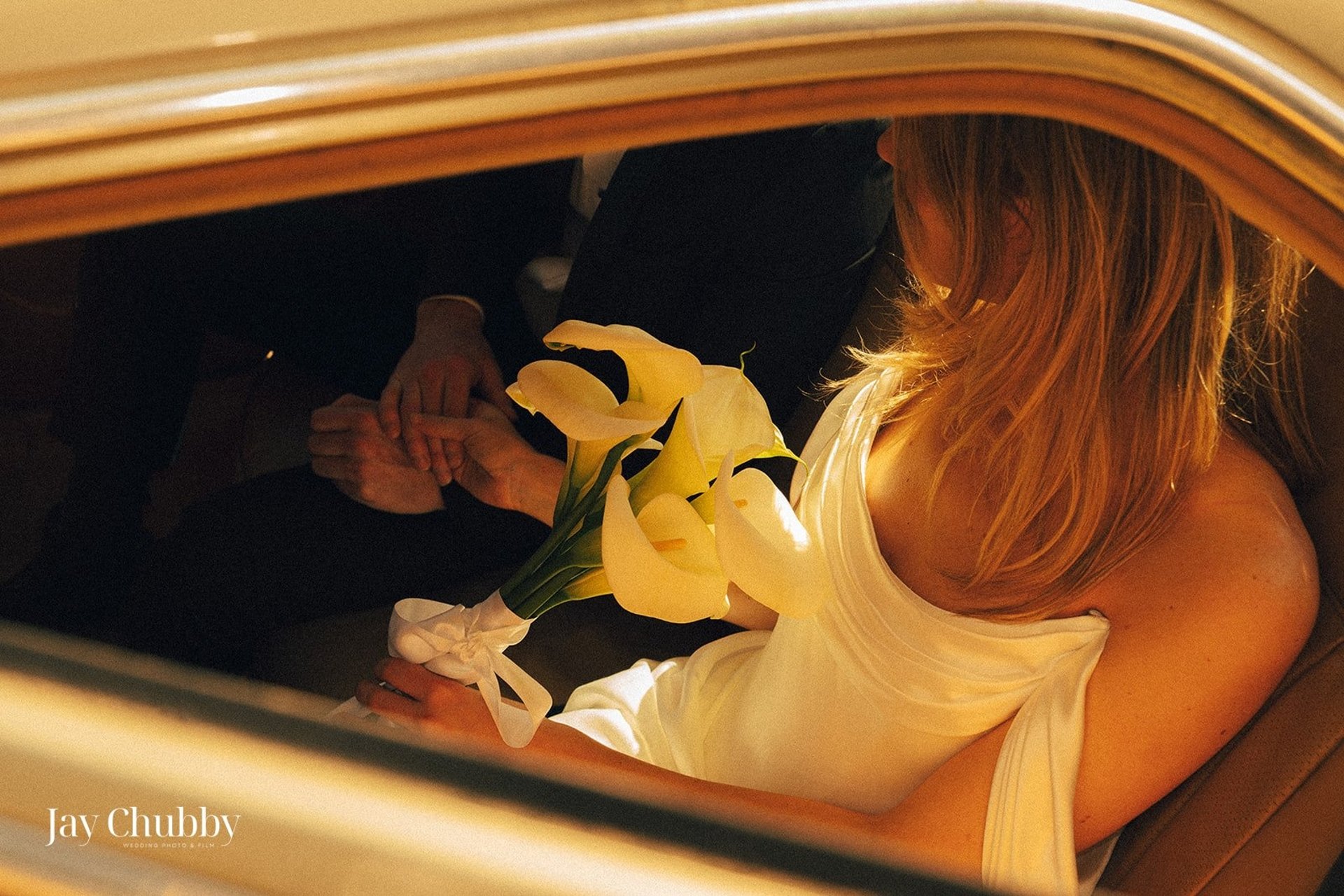 man and woman holding hands focus photo