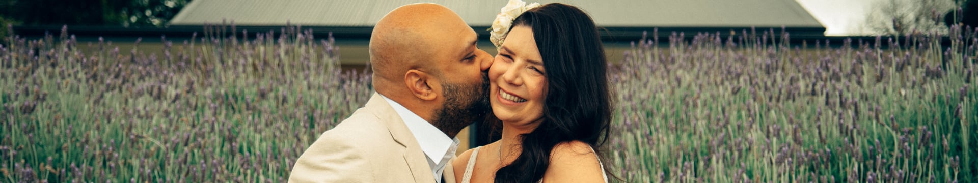 bride and groom on green grass field