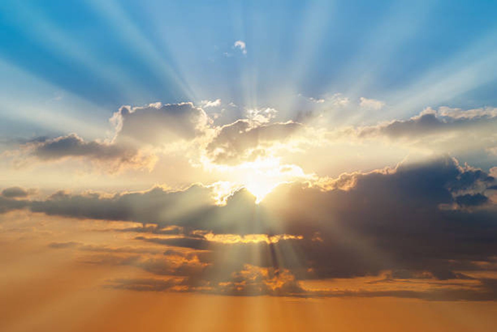 a woman standing in front of a round mirror