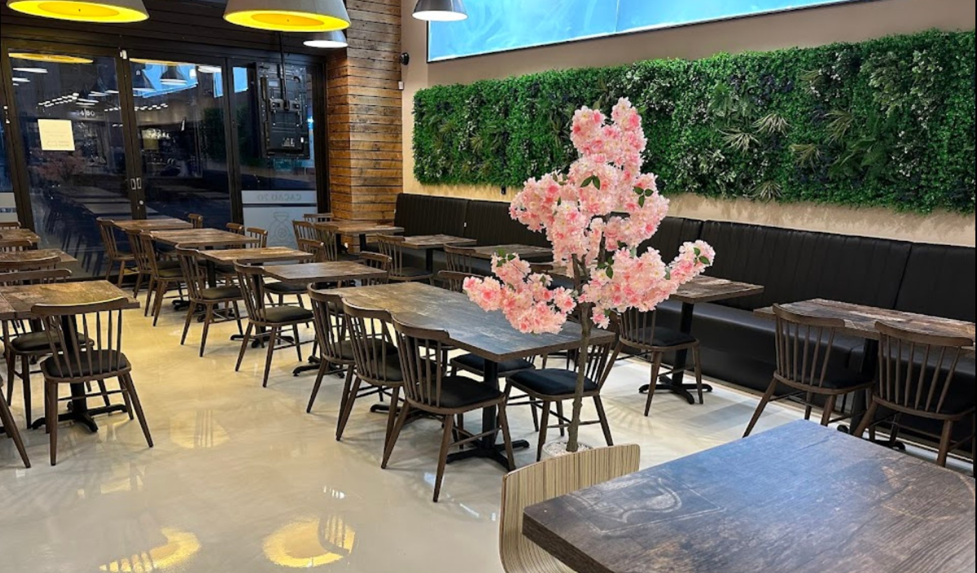 black and brown leather padded tub sofa