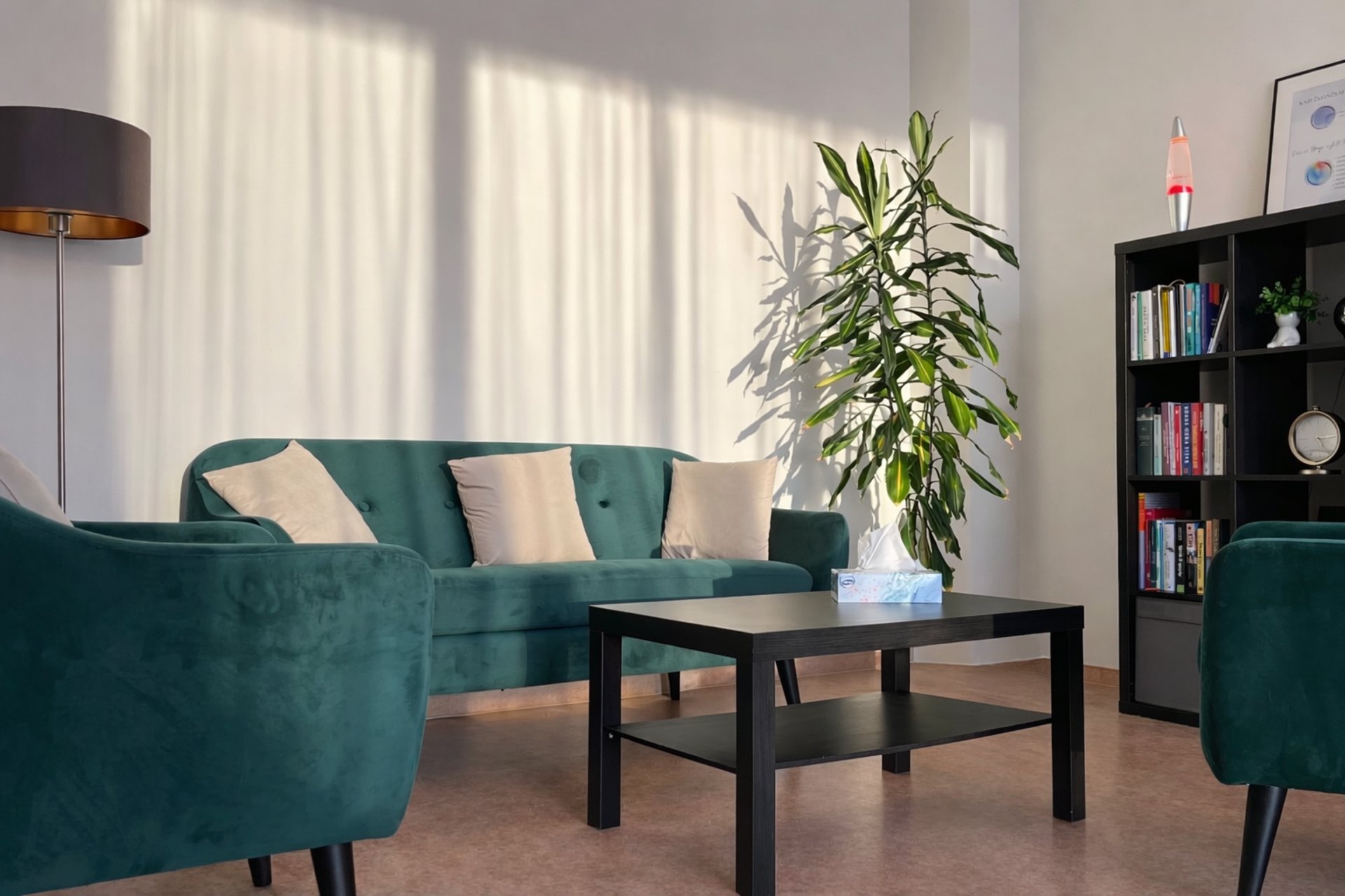 black and brown leather padded tub sofa