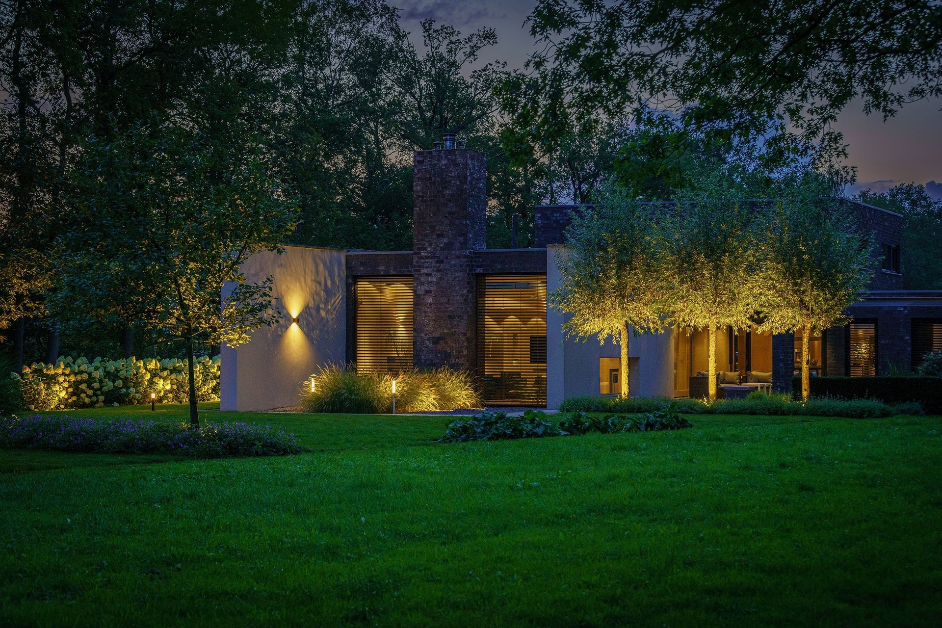 an abstract photo of a curved building with a blue sky in the background