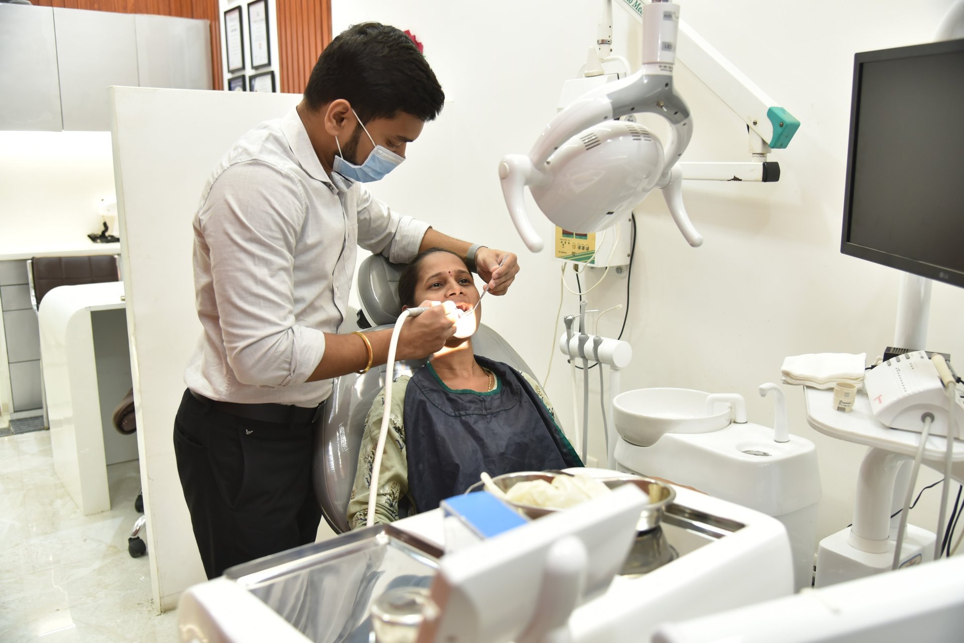 white candle on black textile
